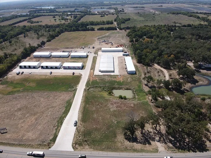 Birds eye view of property featuring a rural view and a water view