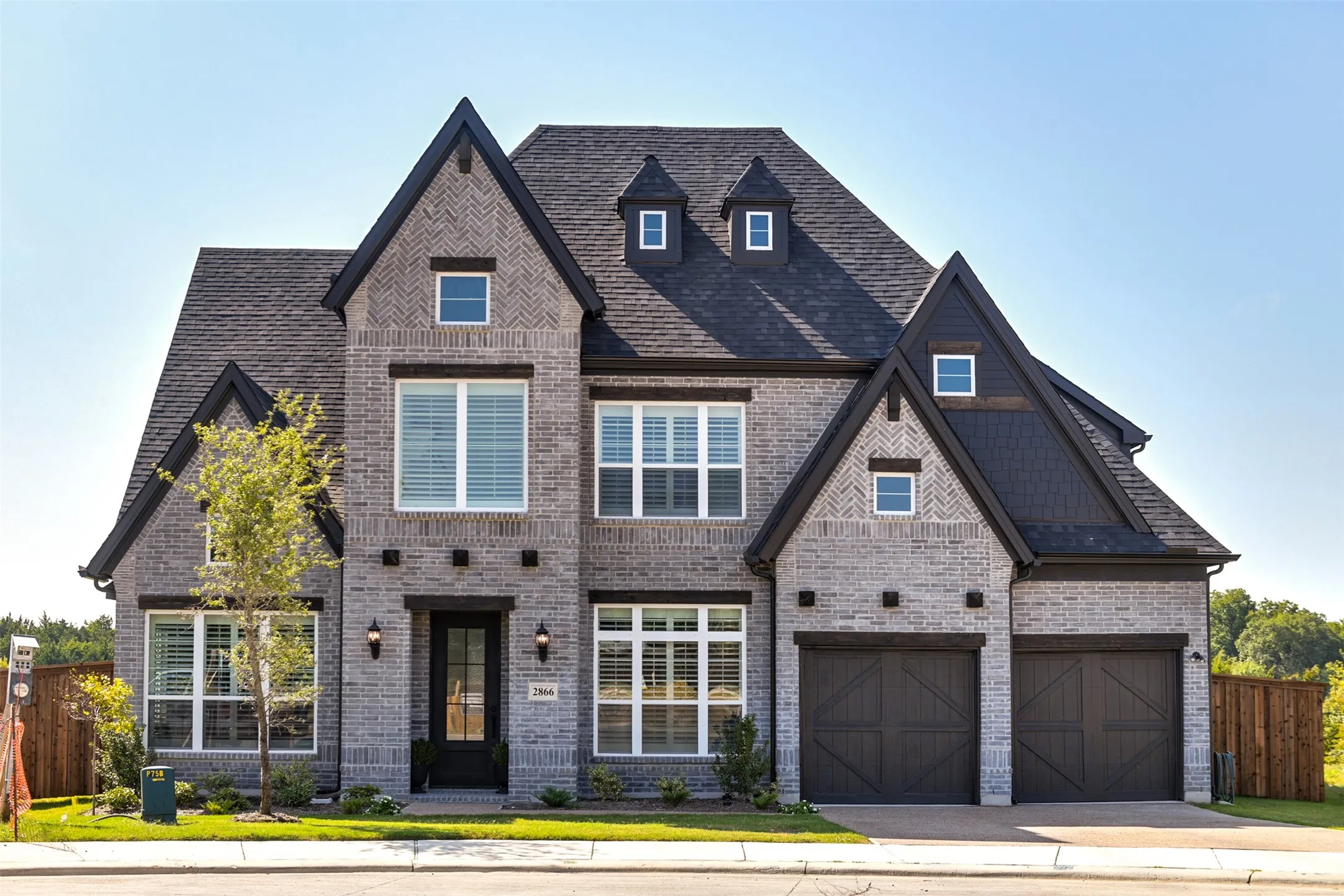 View of front of property with a garage