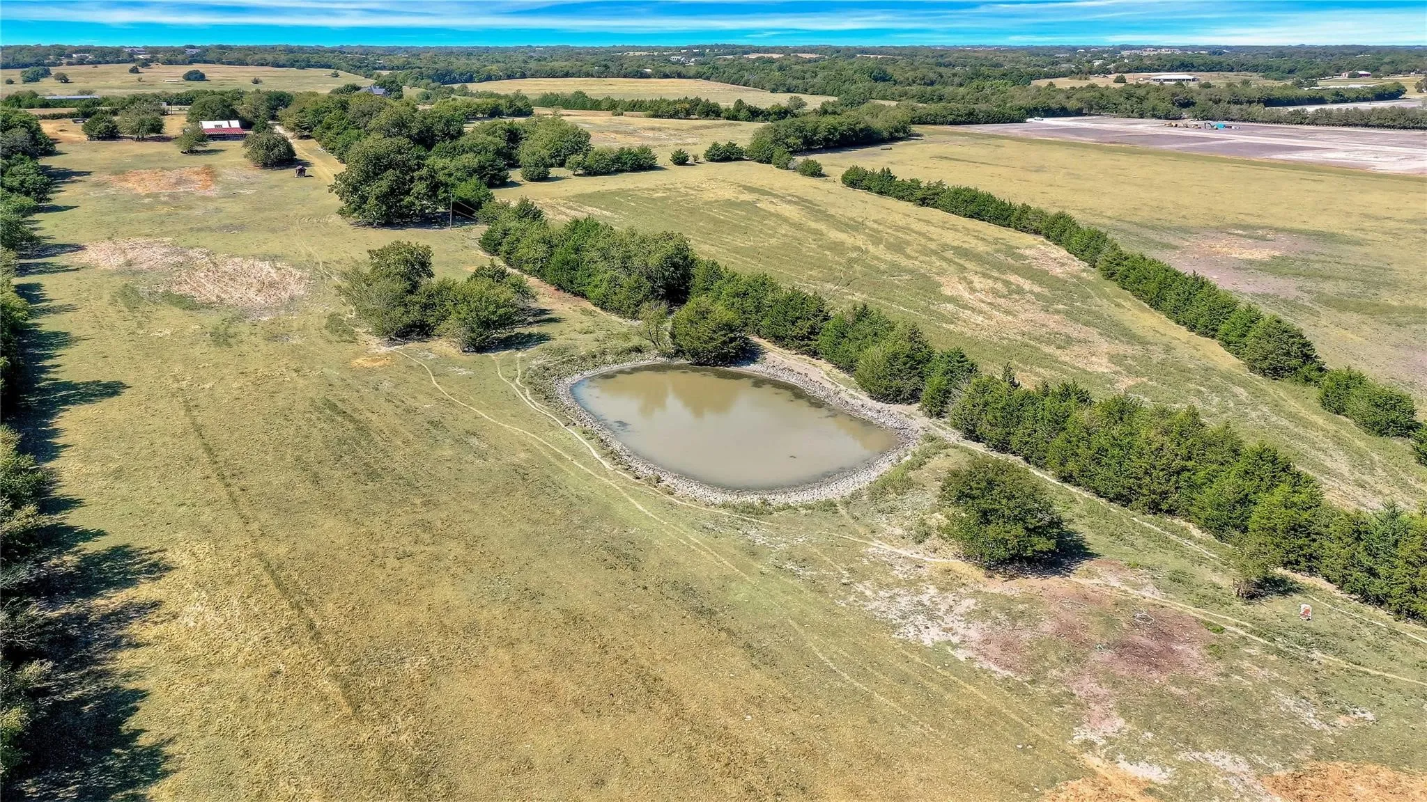 Bird's eye view with a rural view and a water view