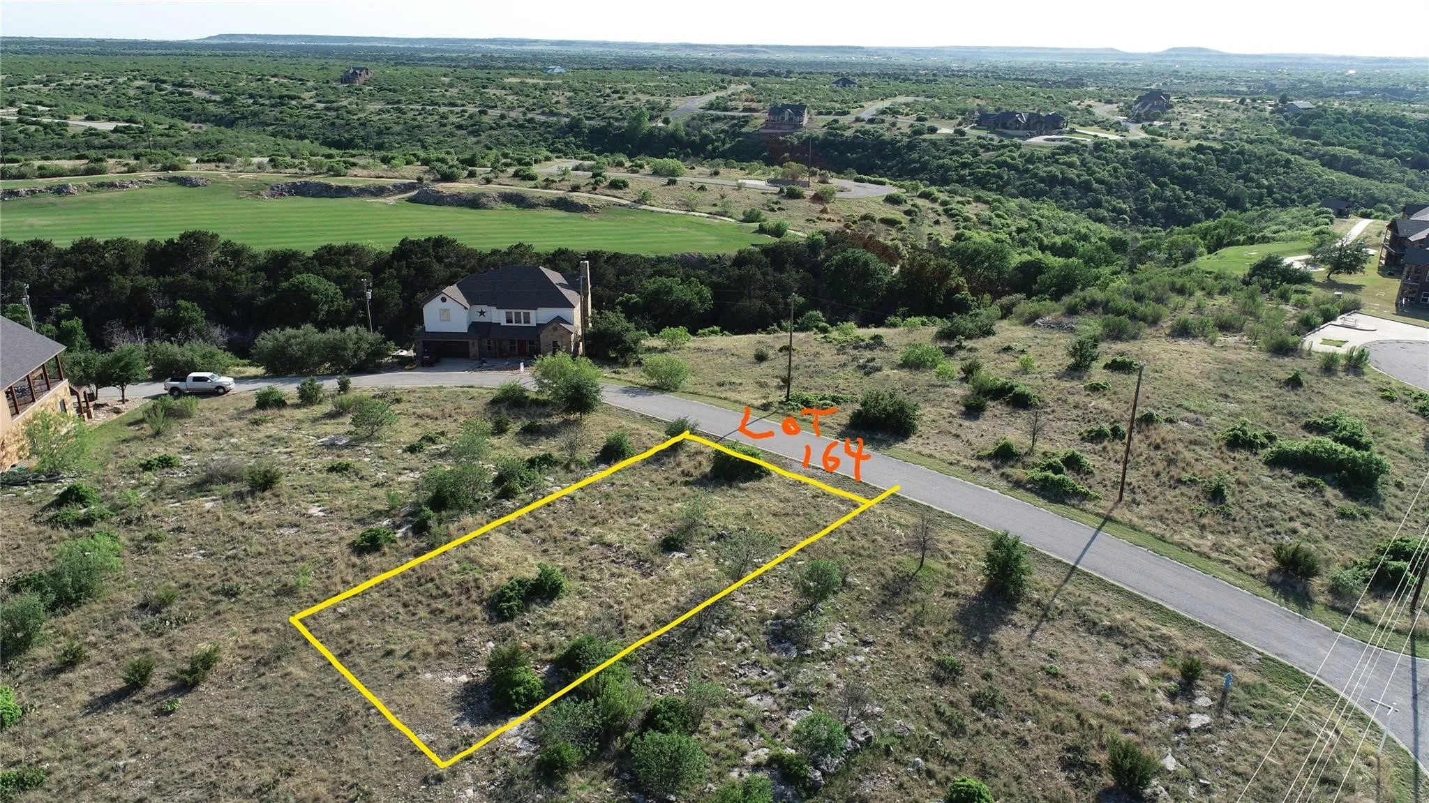 Birds eye view of property featuring a rural view