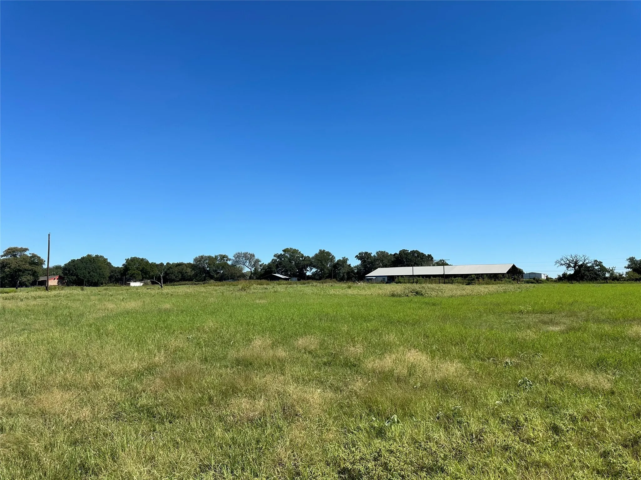 View of yard with a rural view