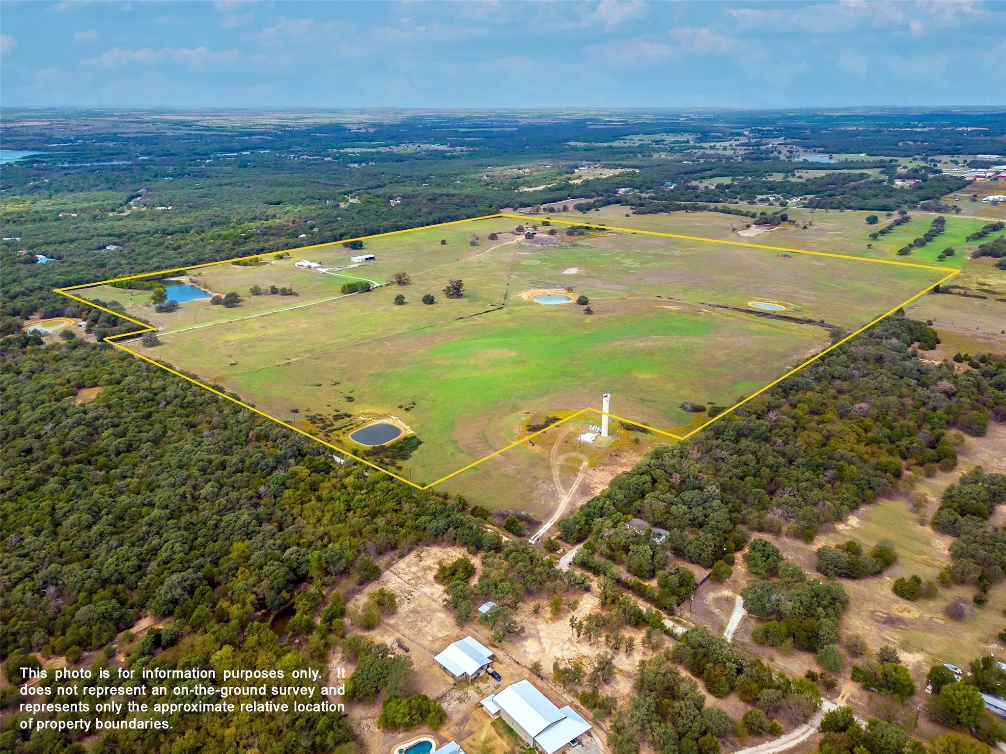 PROPERTY AERIAL...Front And Side View