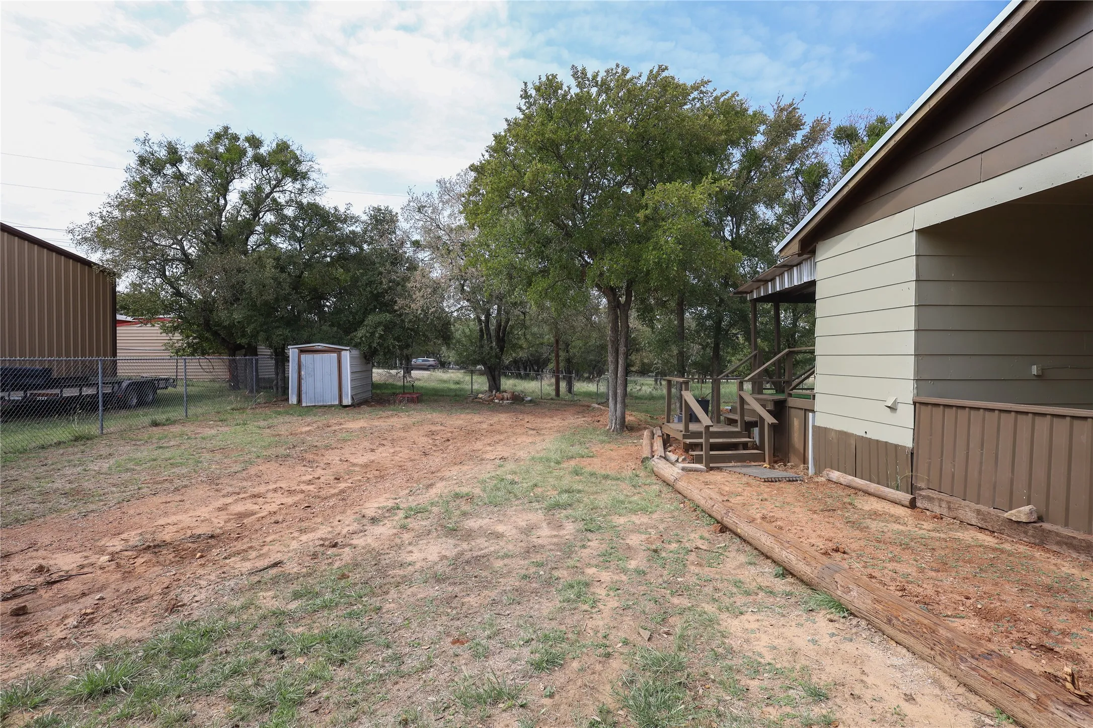 View of yard with a shed