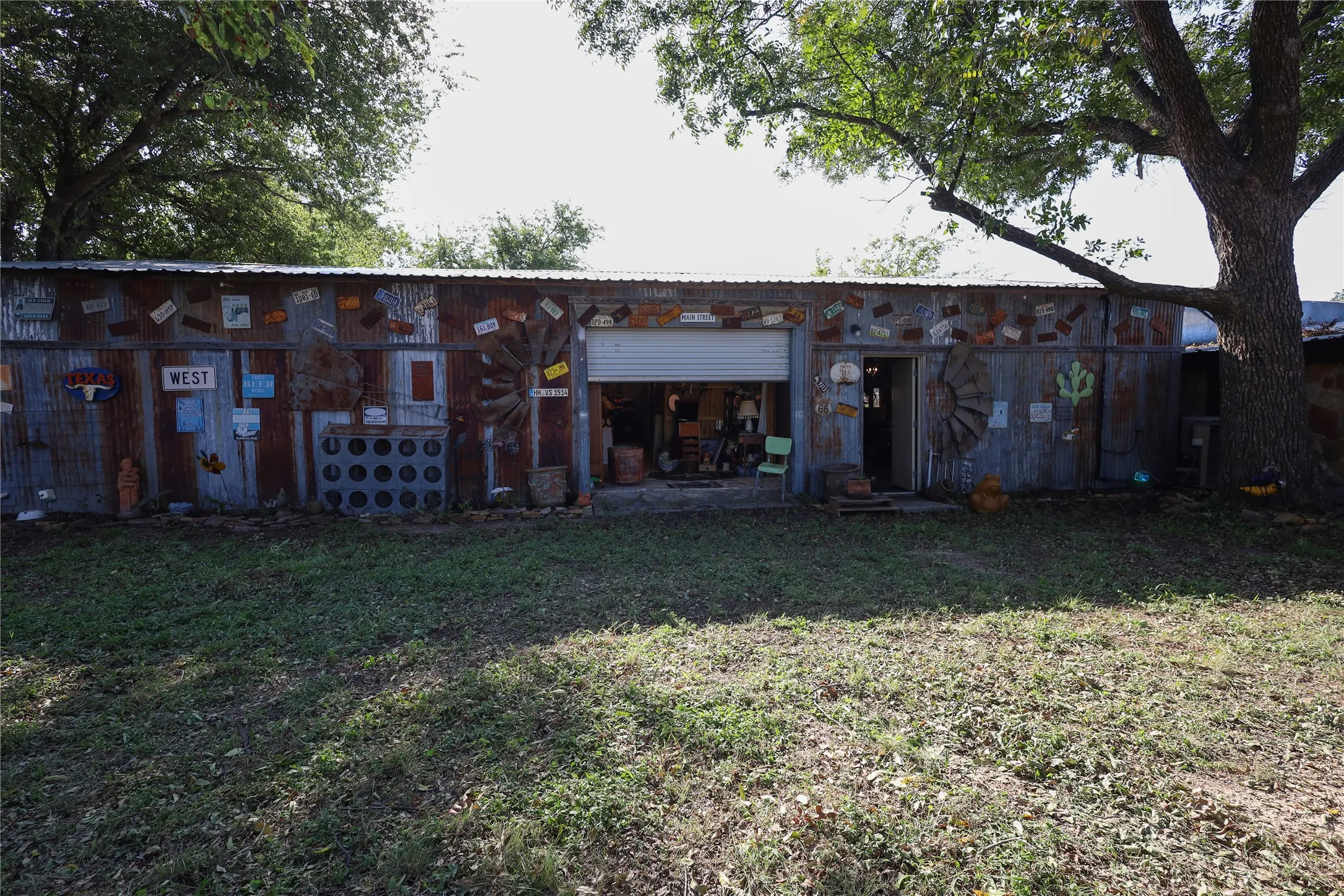 Back of property featuring a yard