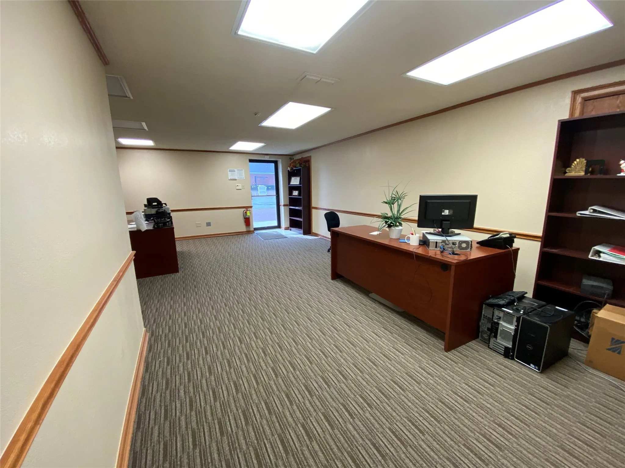 View of carpeted home office