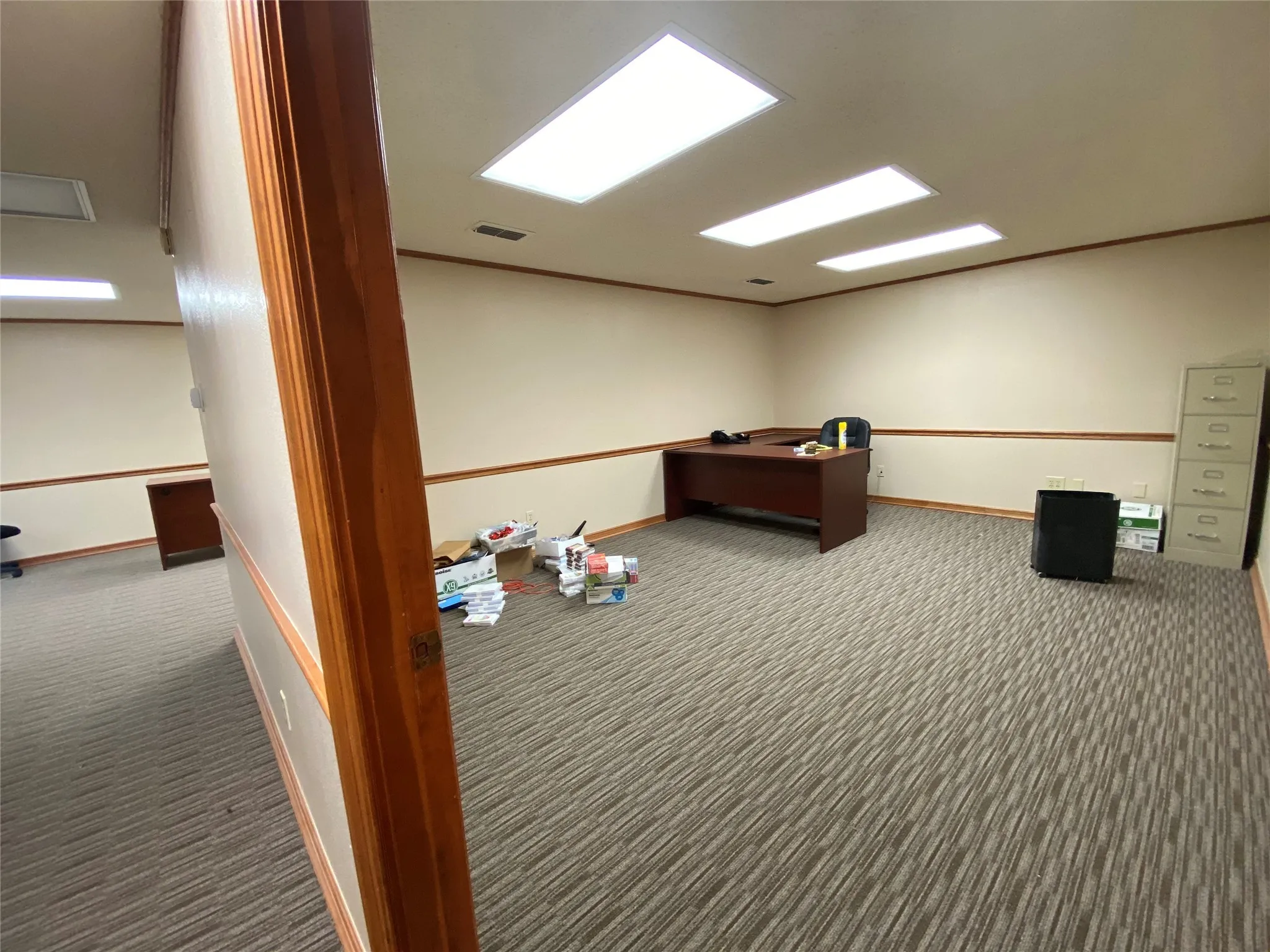 Office area with carpet flooring
