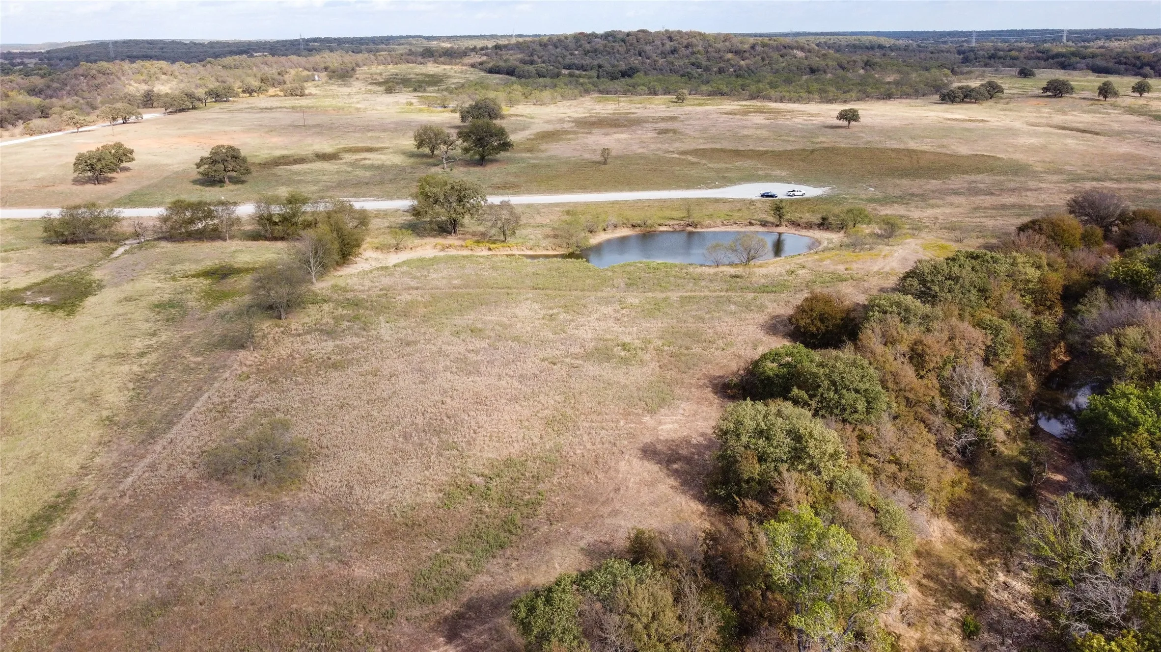 Bird's eye view featuring a water view and a rural view