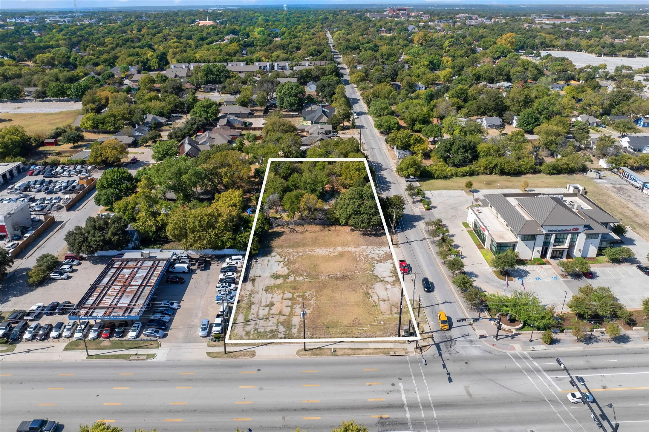 Corner Lot 818 E Rogers and the 2 yellow Single Family Houses West of the Vacant Lot which are 706 & 708 E Rodgers are being sold as a package only. Please No exceptions. Each one are priced individually.