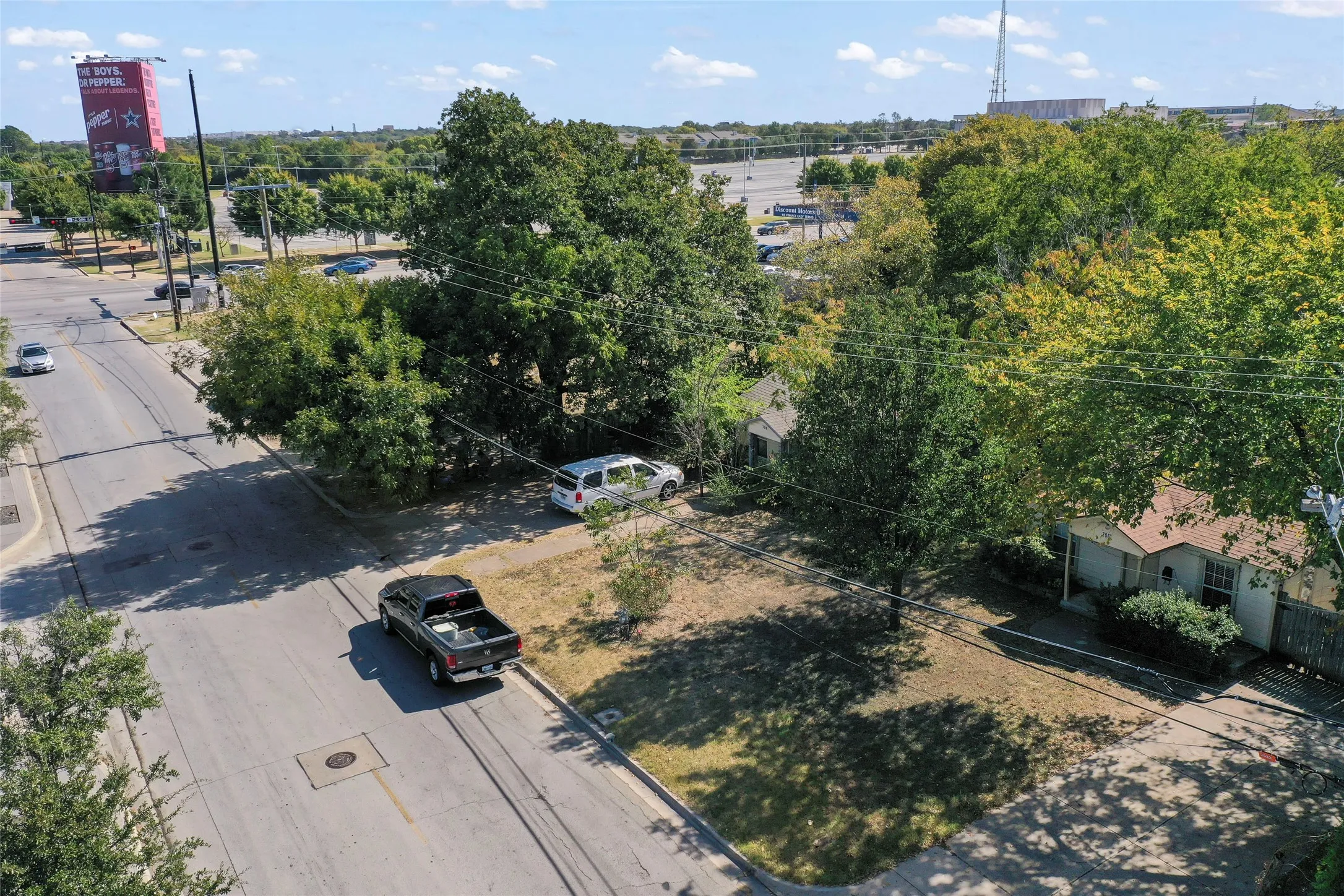 These 2 Single Family are 706 & 708 E Rogers St. and are being sold as a package with 818 E Rogers, the Vacant Corner Lot. Each property are individually priced.