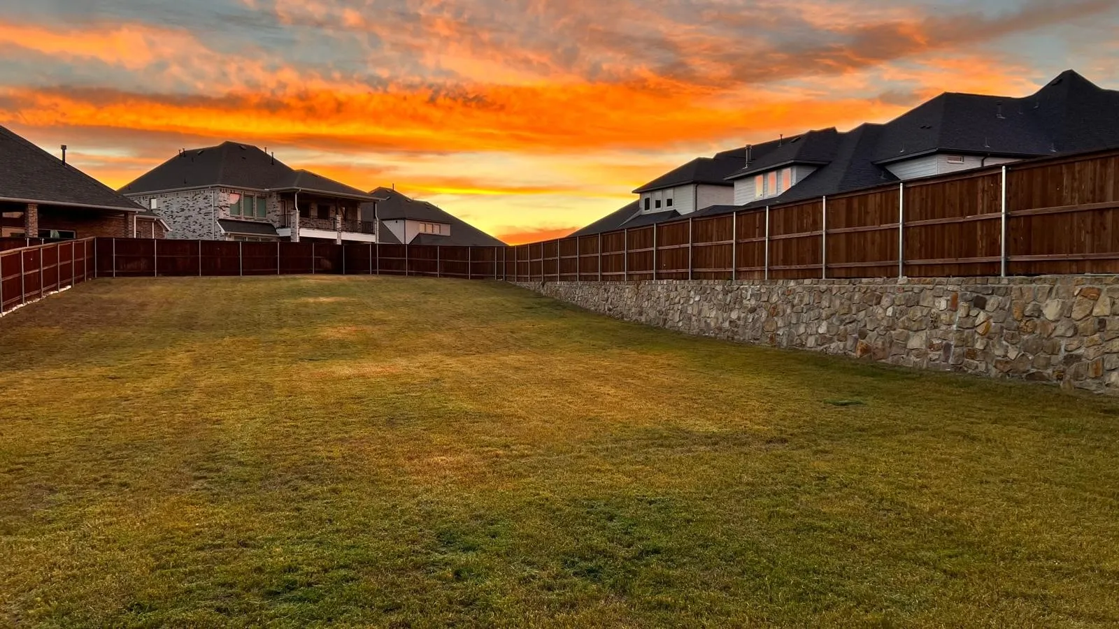 View of yard at dusk
