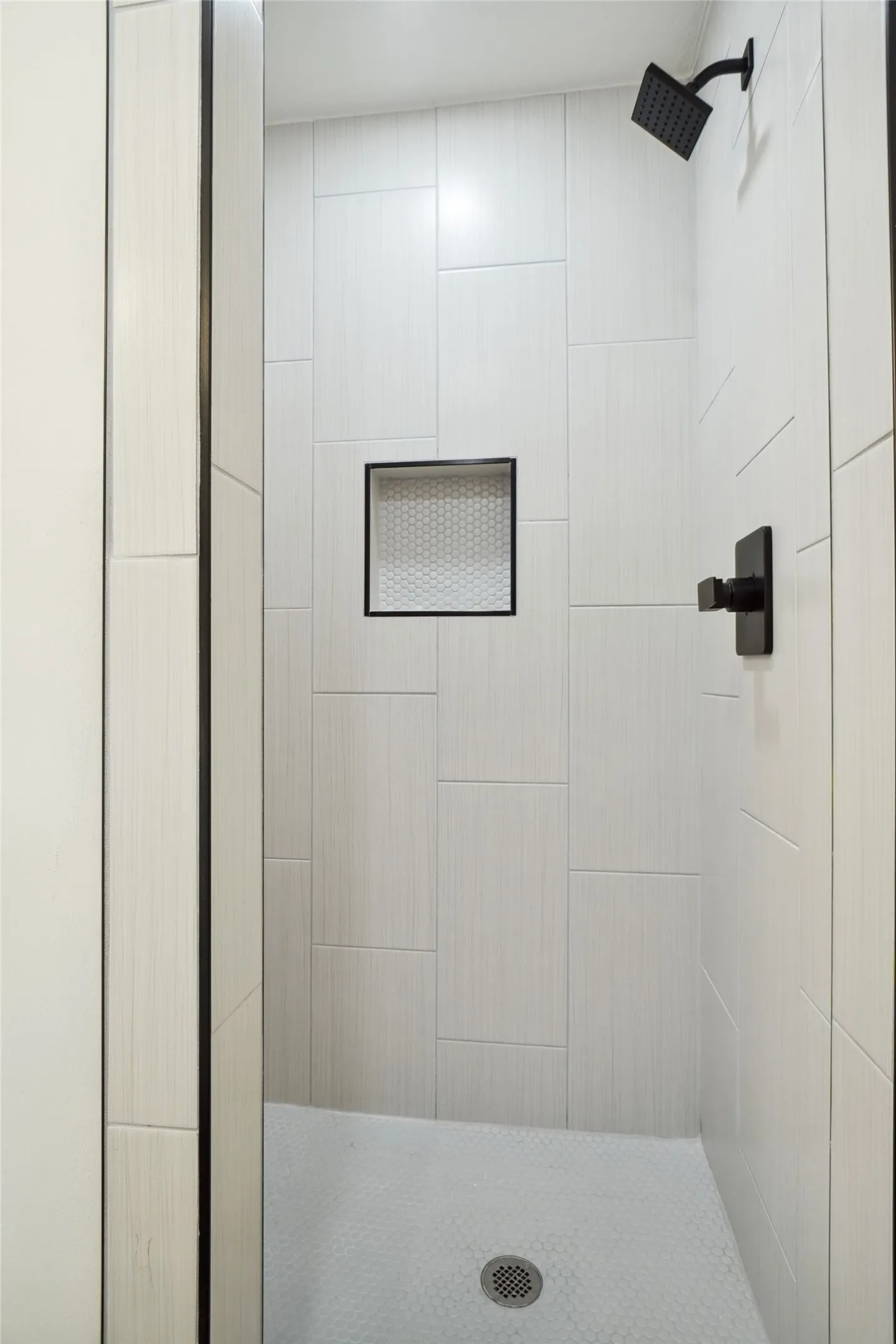 Bathroom with tiled shower
