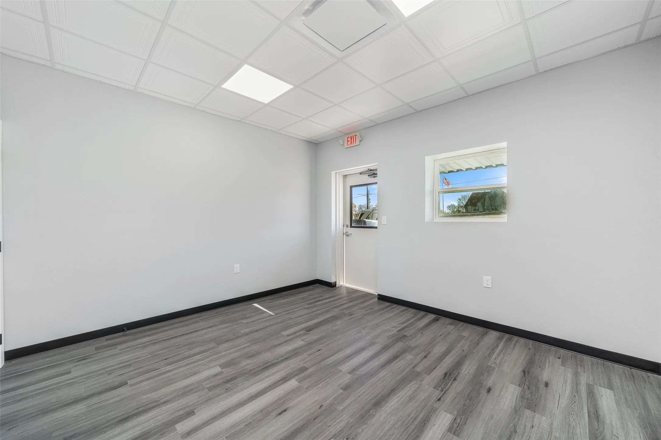 This is a view of the front office space included on all units! Office space is measured at 13' x 12.' (This is including the bathroom)