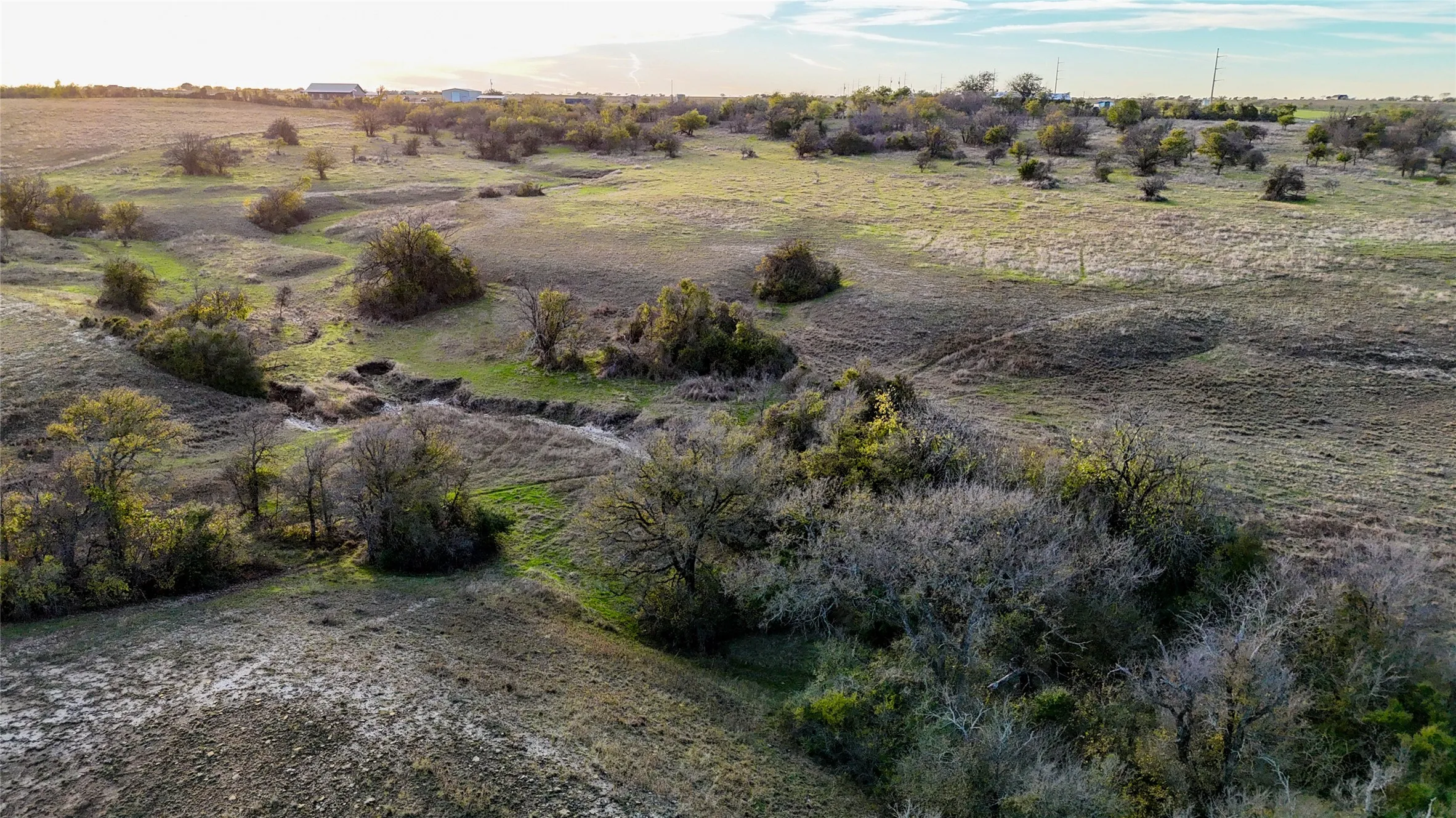 Birds eye view of property with a rural view
