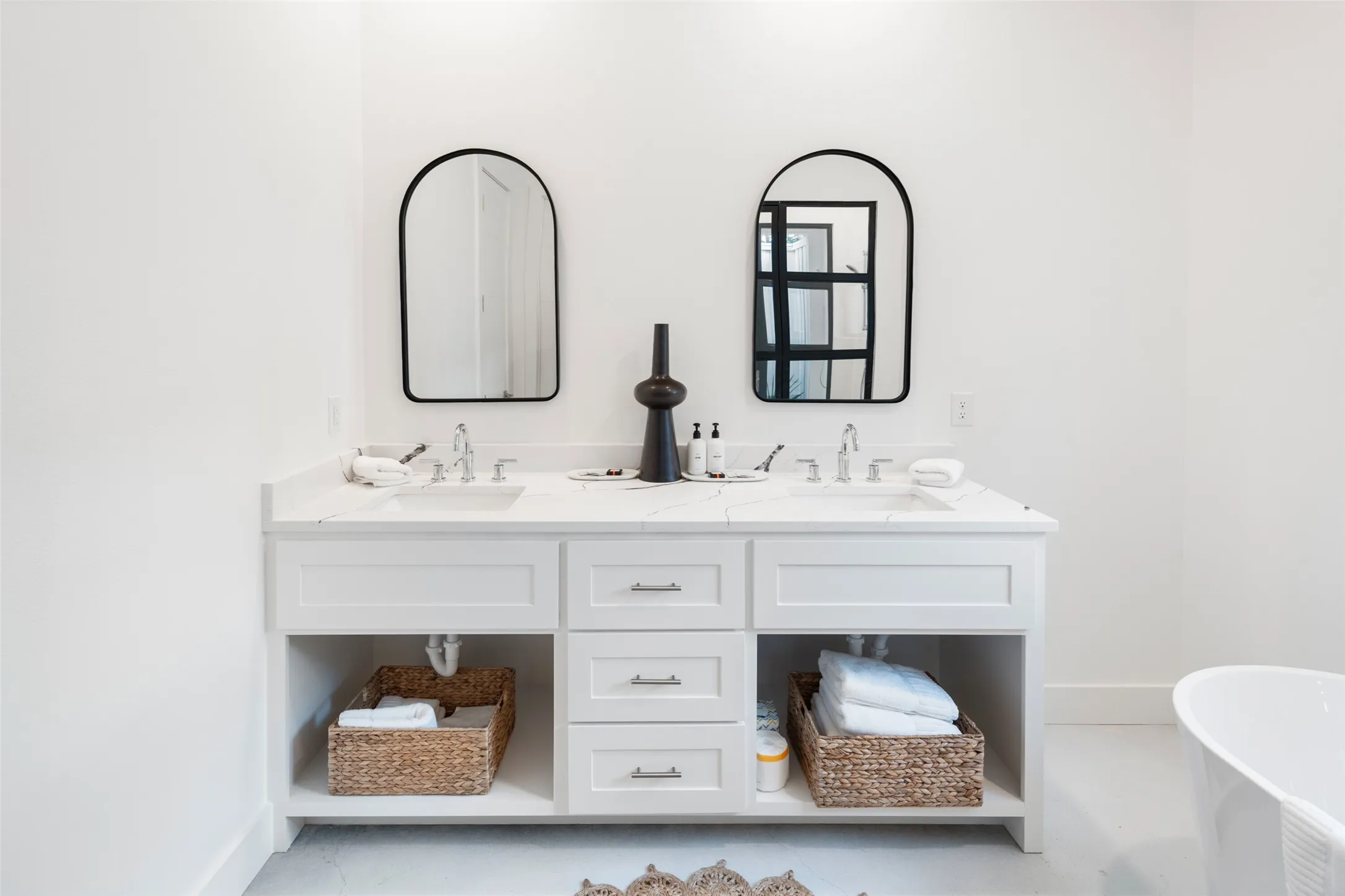 Bathroom with a bath and vanity