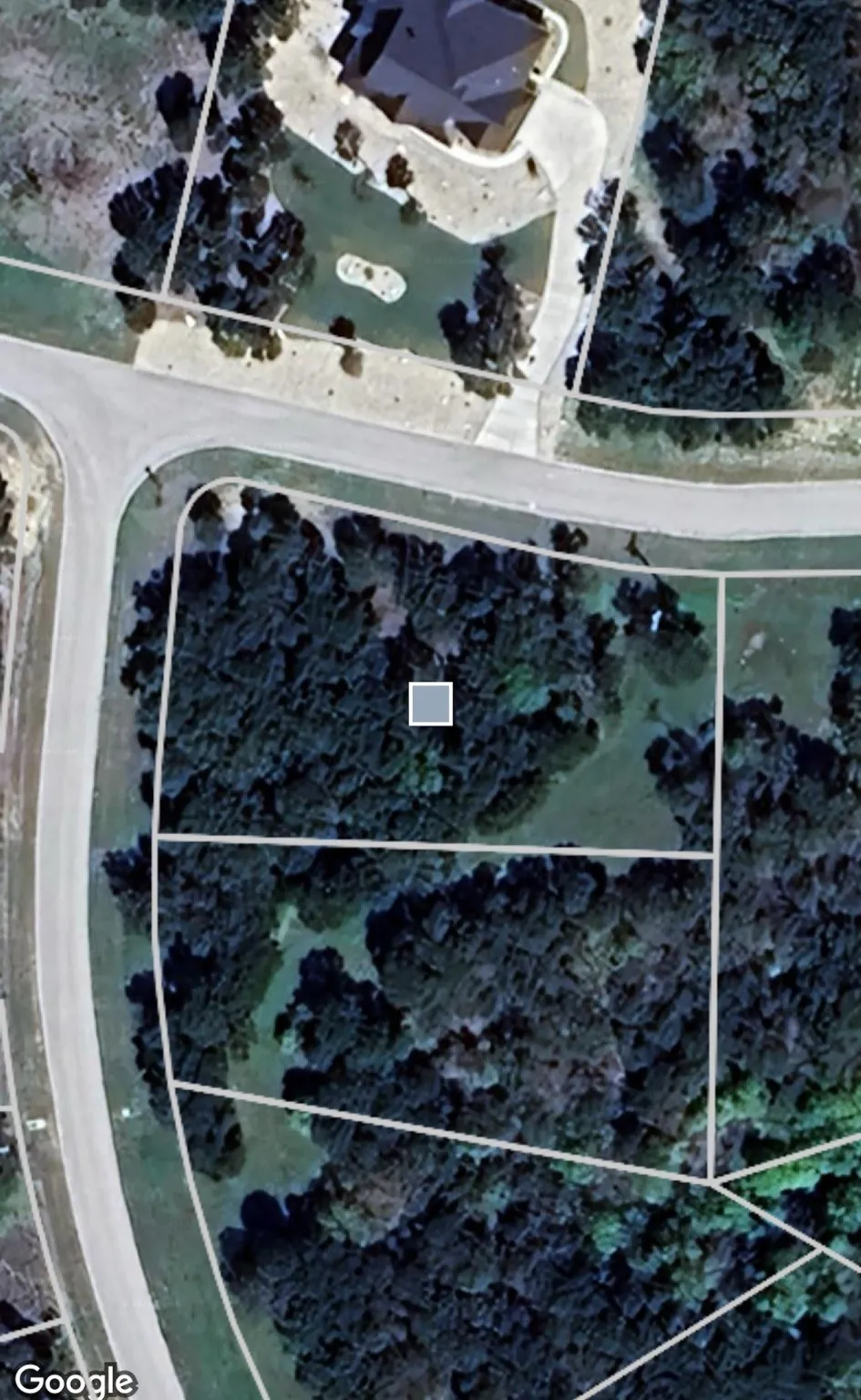 Aerial view with surrounding lots