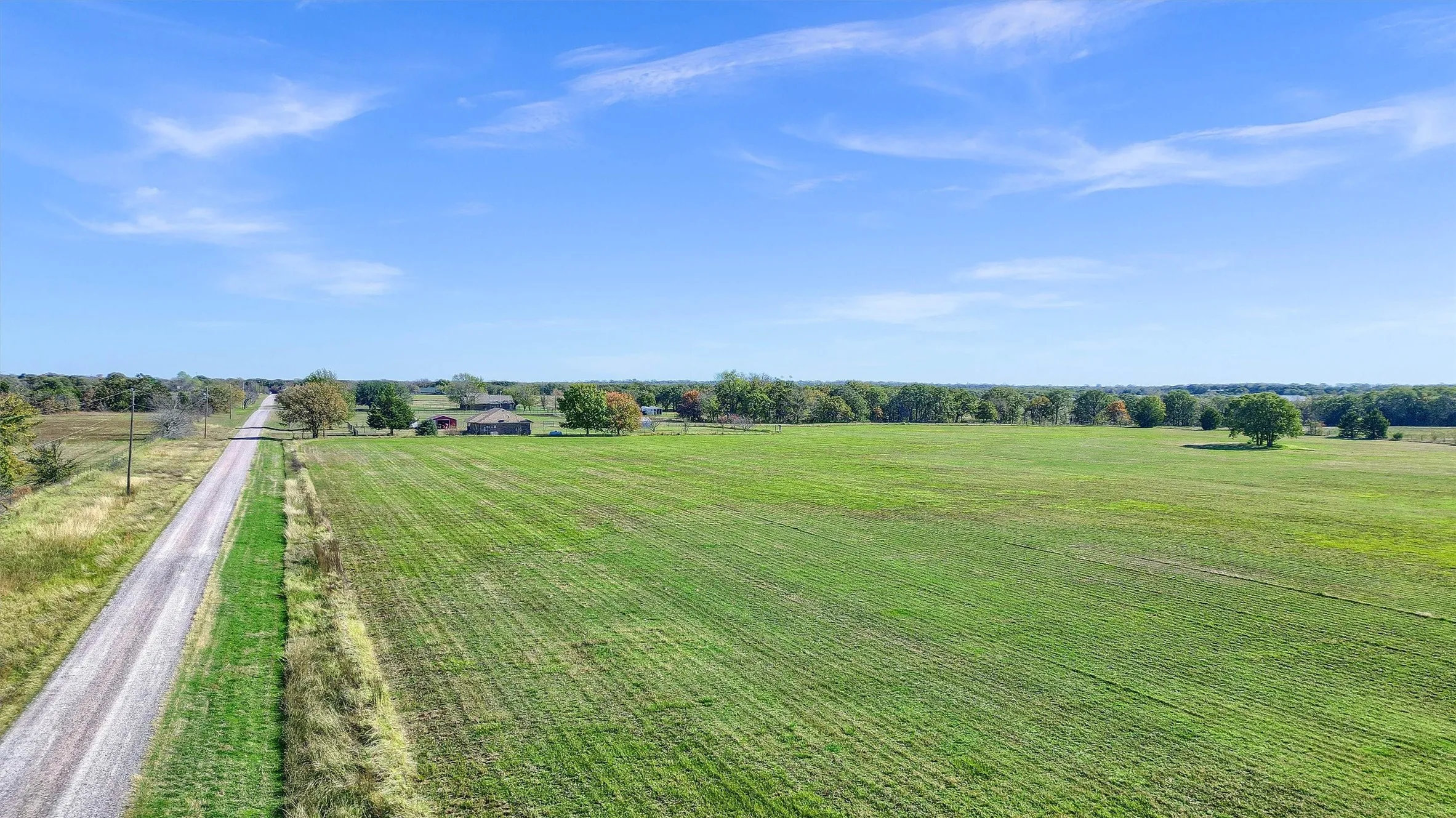 View of yard with a rural view