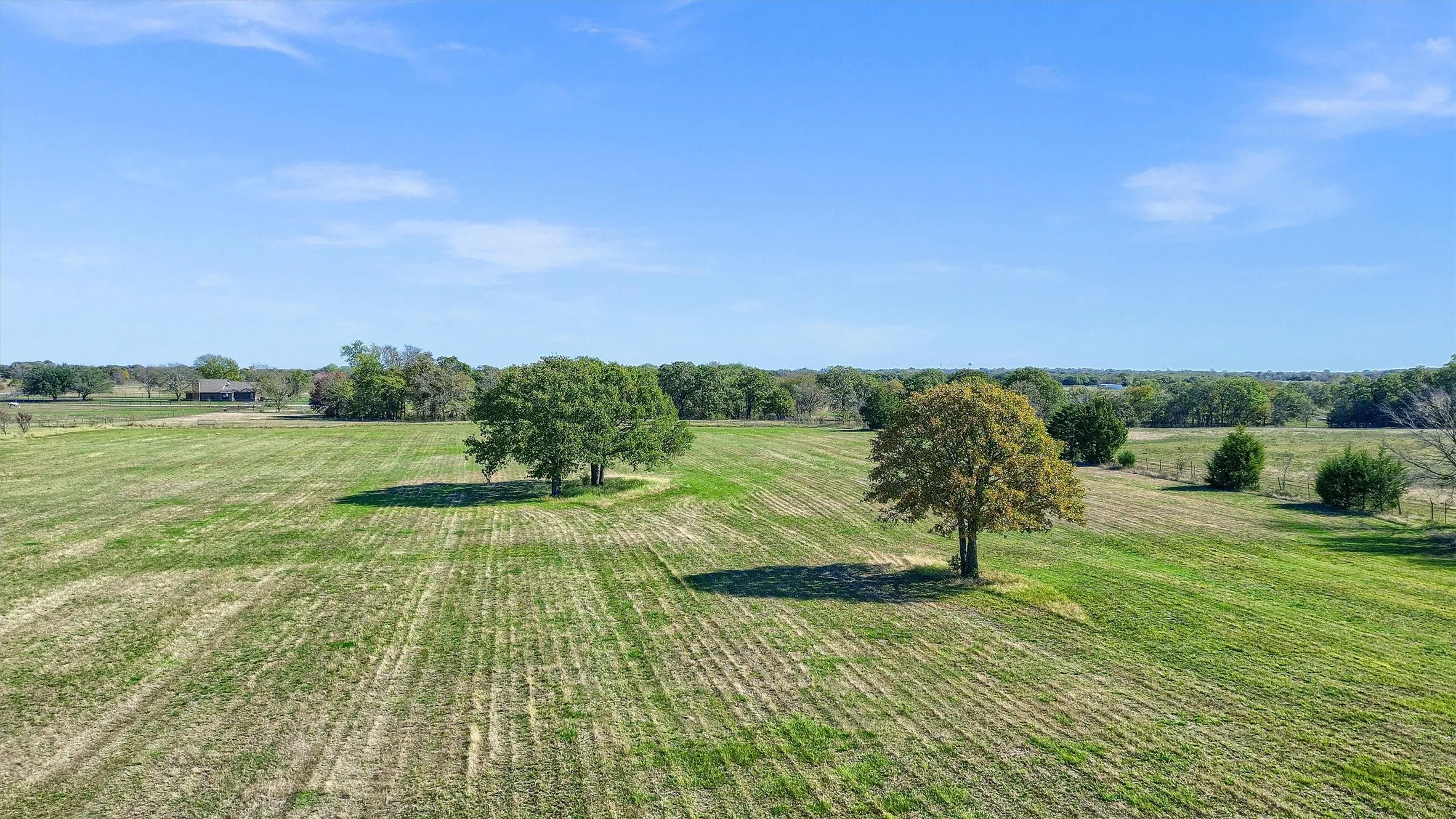 View of yard with a rural view