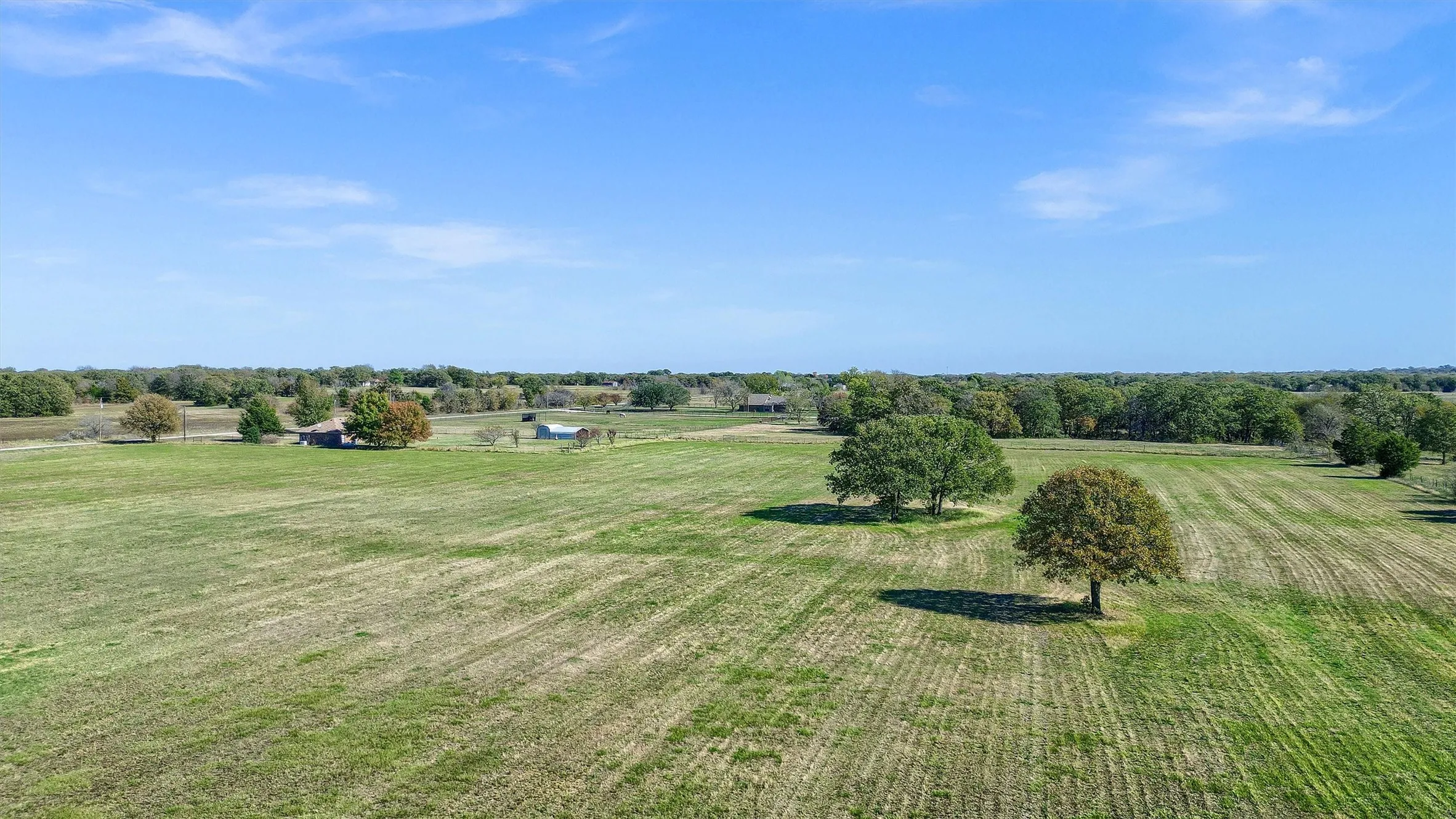 View of yard with a rural view
