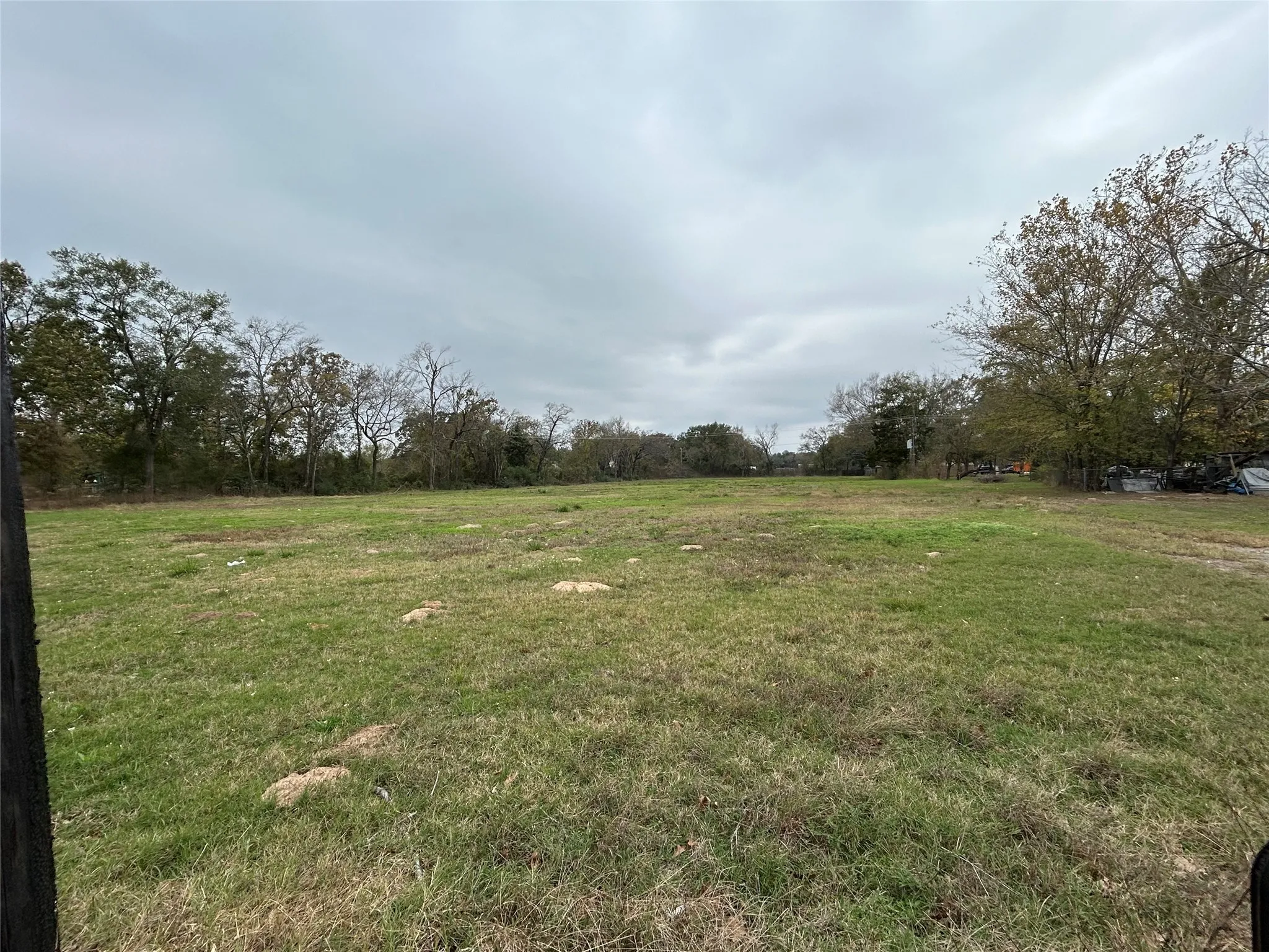 View of yard with a rural view