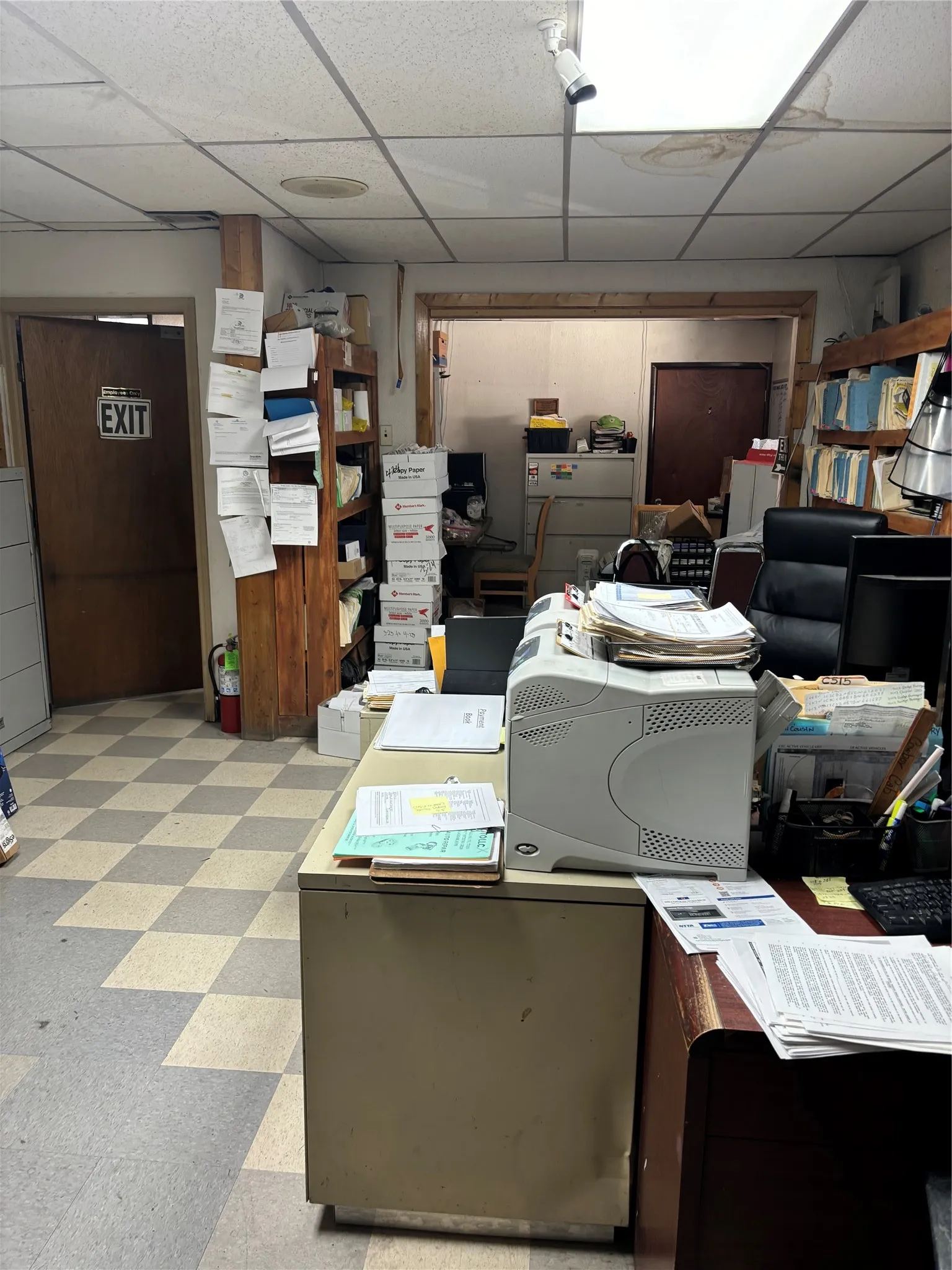 Office space featuring a paneled ceiling