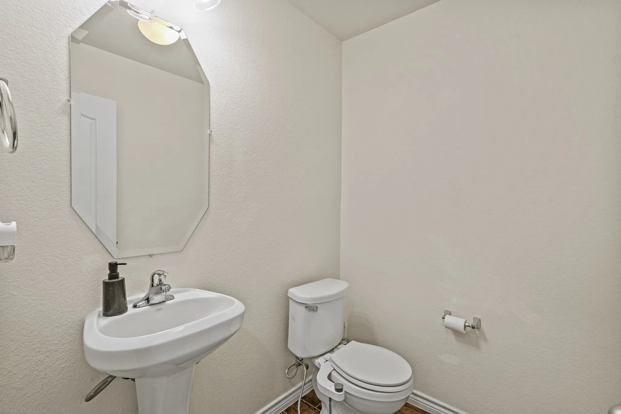 Bathroom with toilet and sink