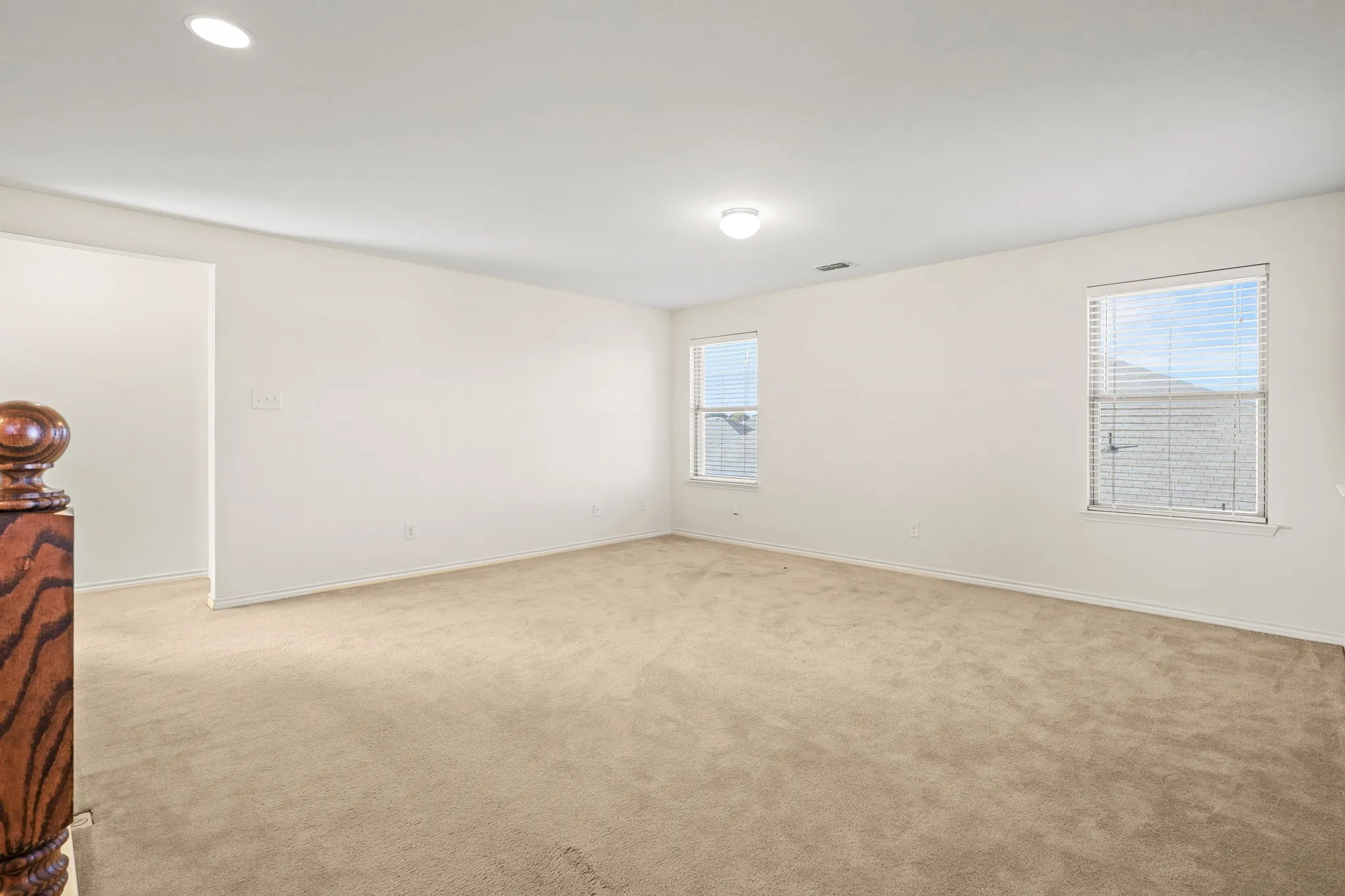 View of carpeted spare room