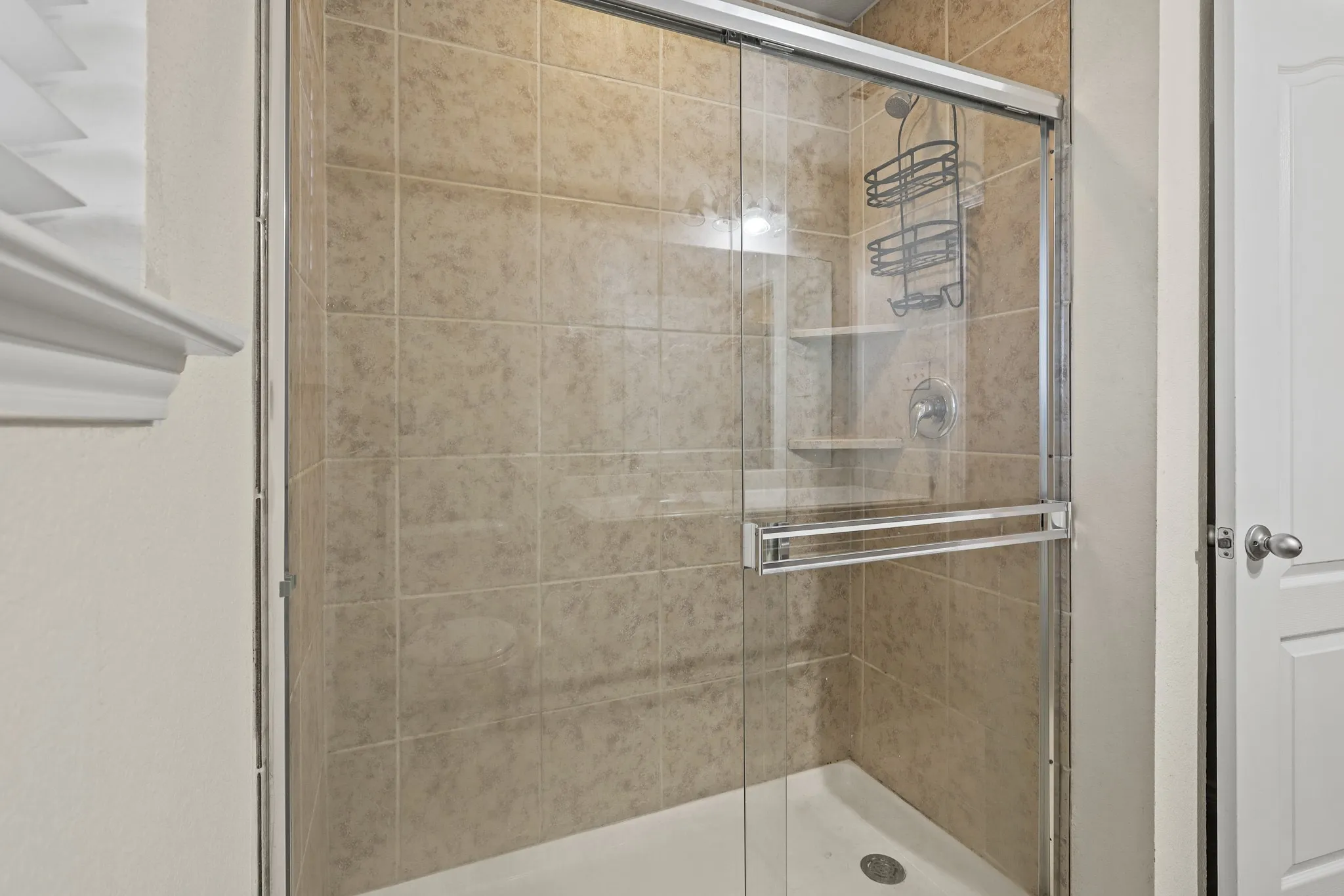 Bathroom with an enclosed shower