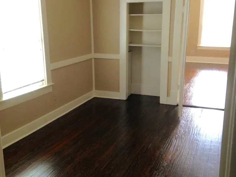 Spare room featuring dark hardwood / wood-style floors