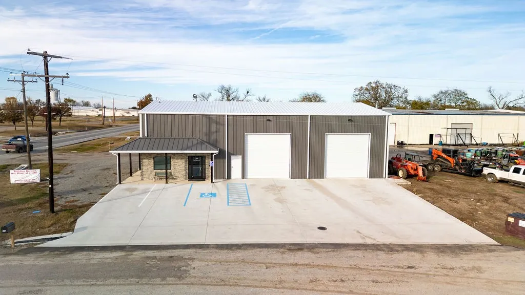 Concrete parking with easy access to office and shop area.