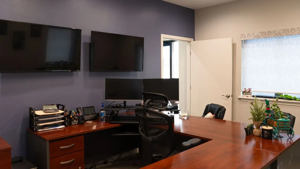 Office space with a healthy amount of sunlight, hardwired security system in place.
