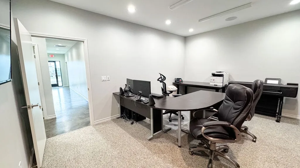 Office space featuring light colored carpet
