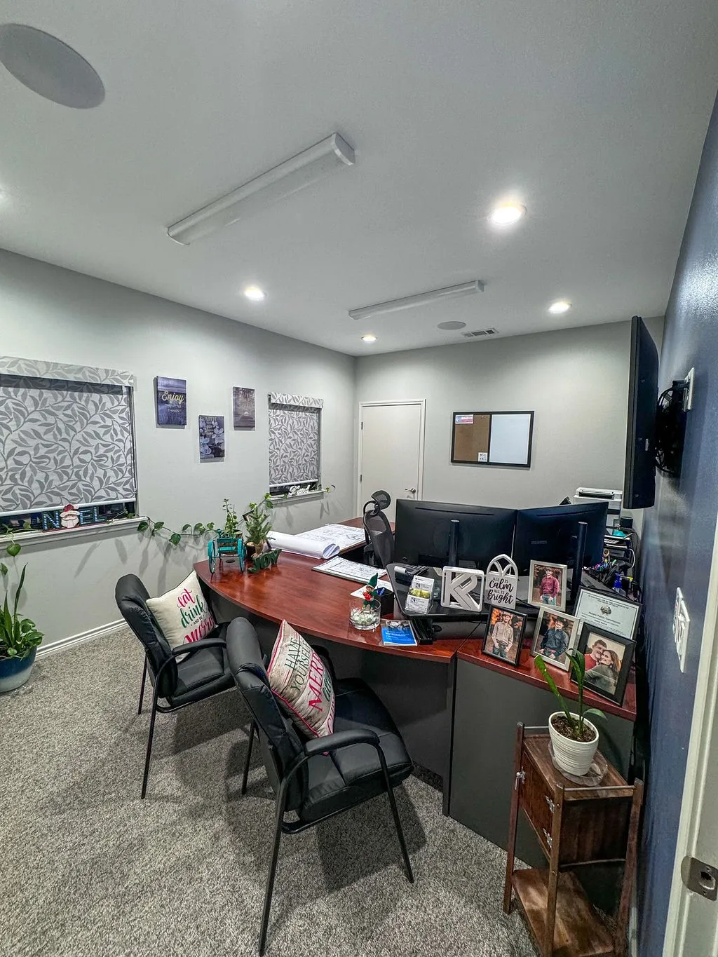 First office space at entrance of building with large attached closet.