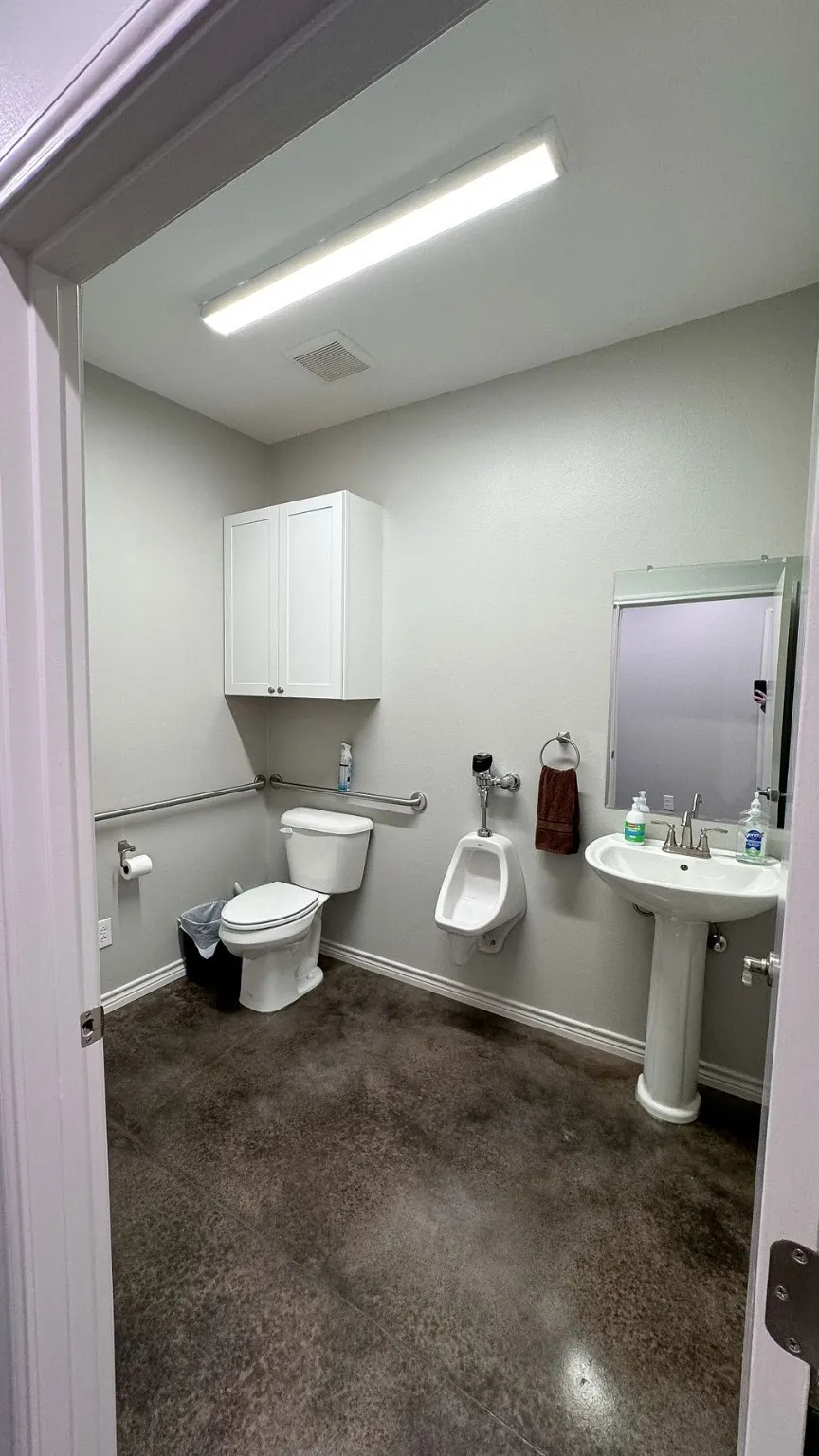Second bathroom within office area. Additional bath located in shop area.