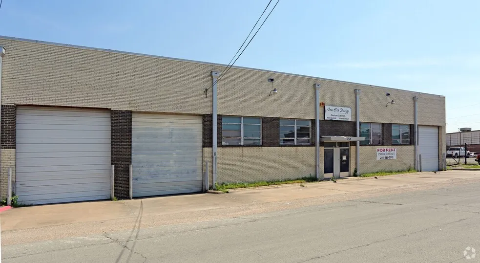 View of property with a garage