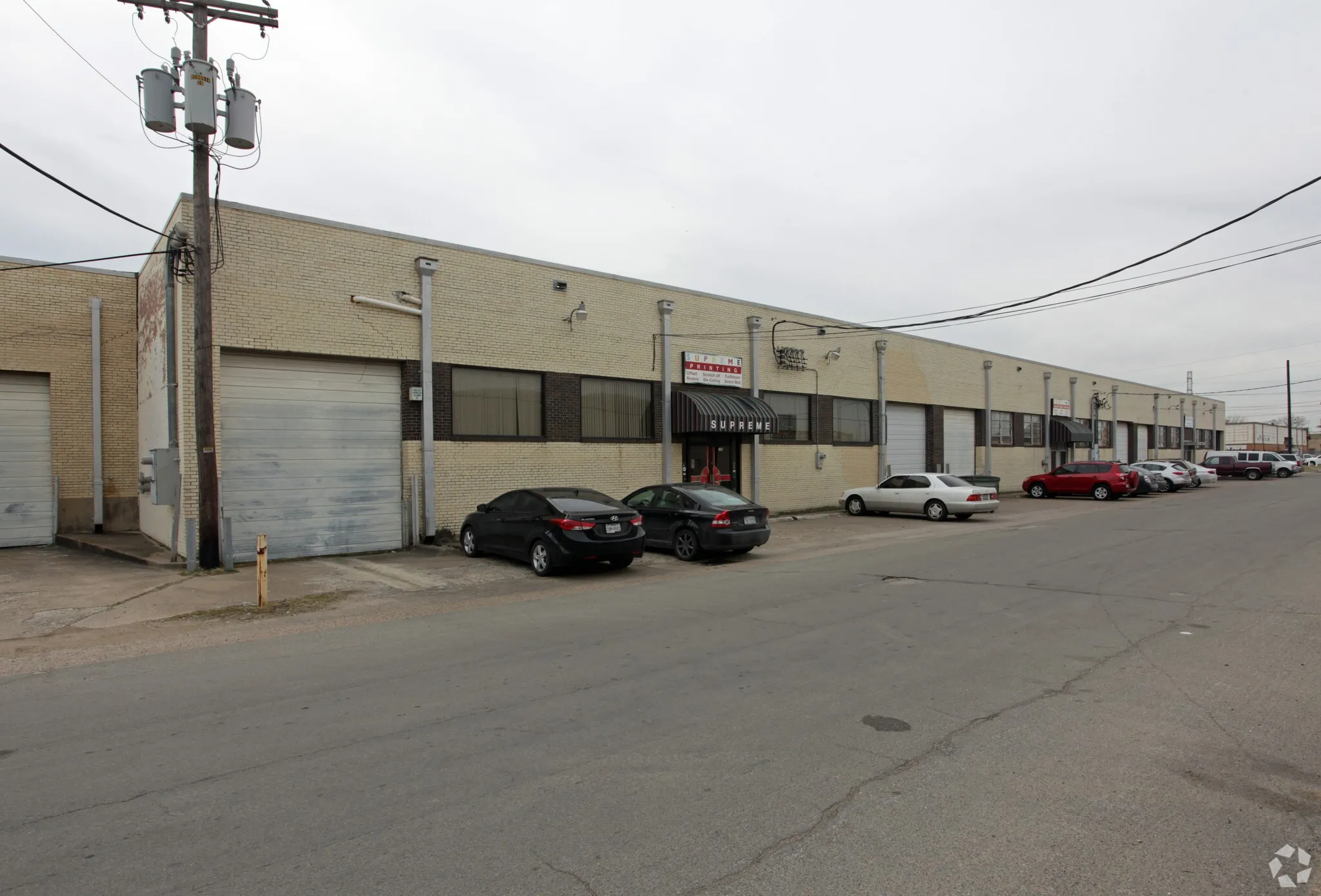 View of property with a garage