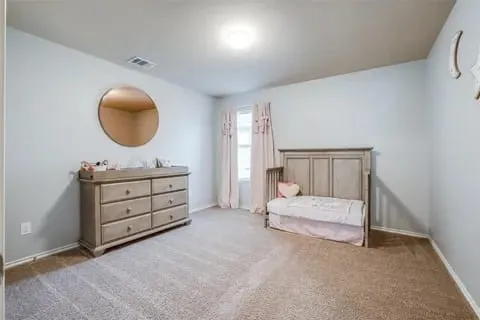 Bedroom with carpet floors