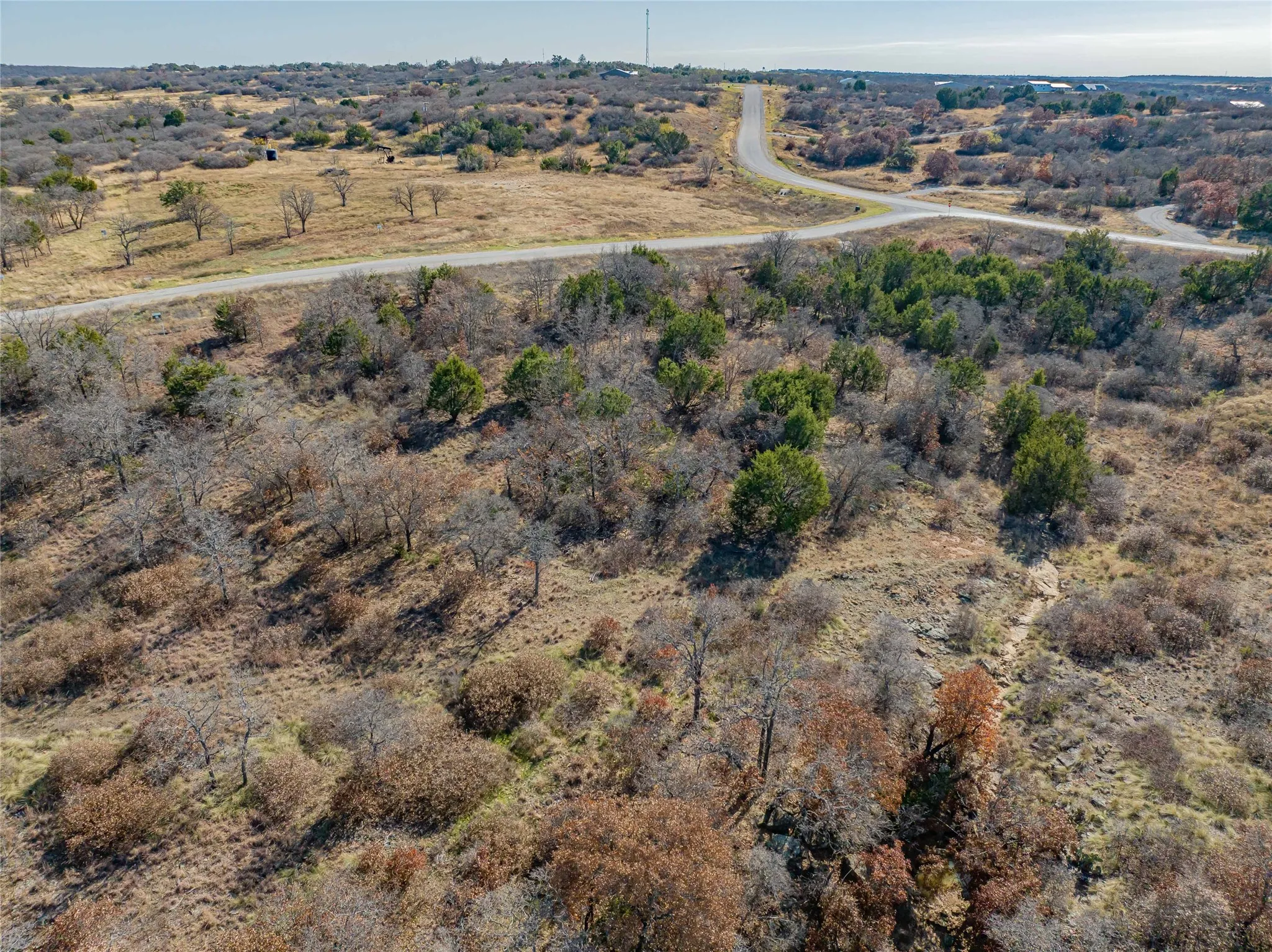 Birds eye view of property featuring a rural view