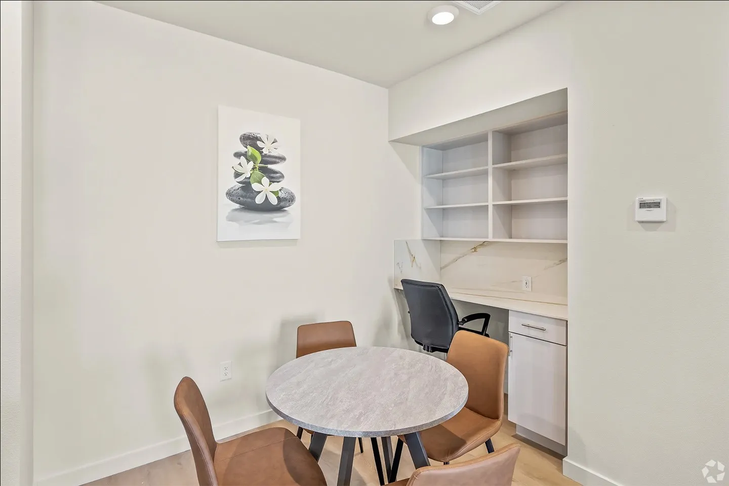 Dining area with light hardwood / wood-style floors