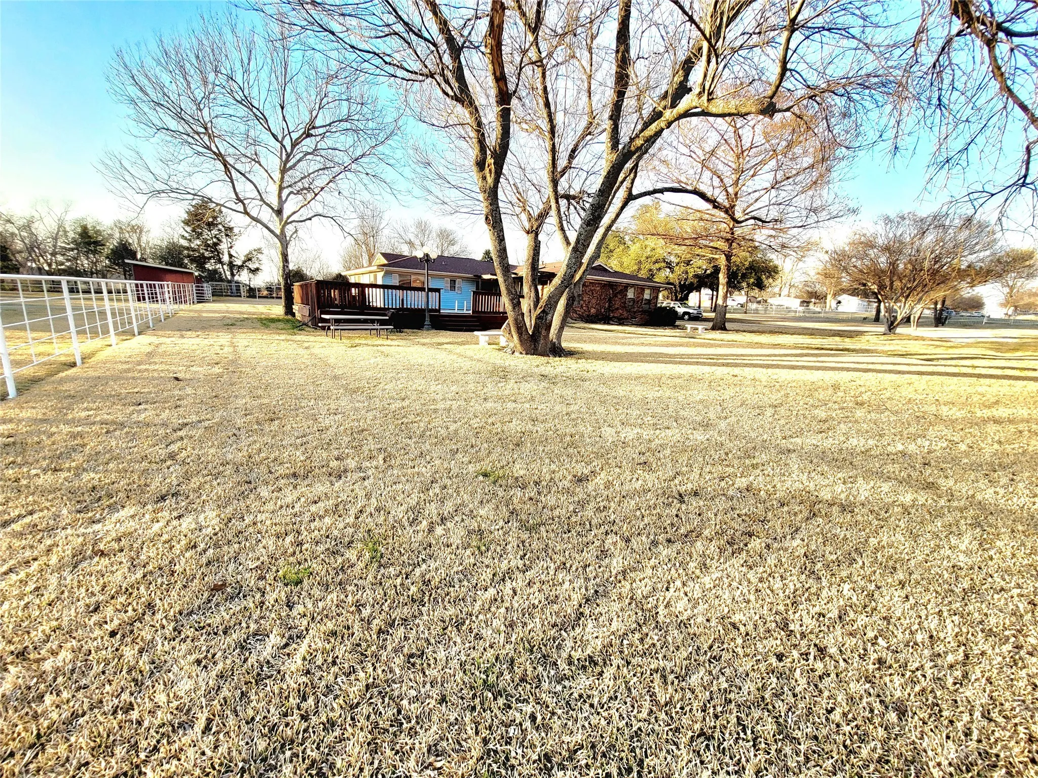 View of yard with a deck