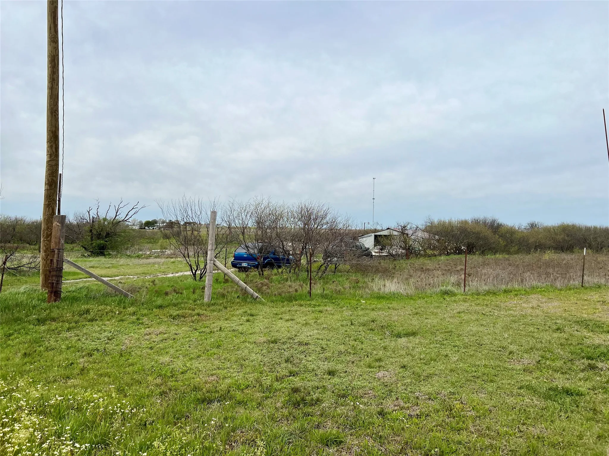 View of yard with a rural view