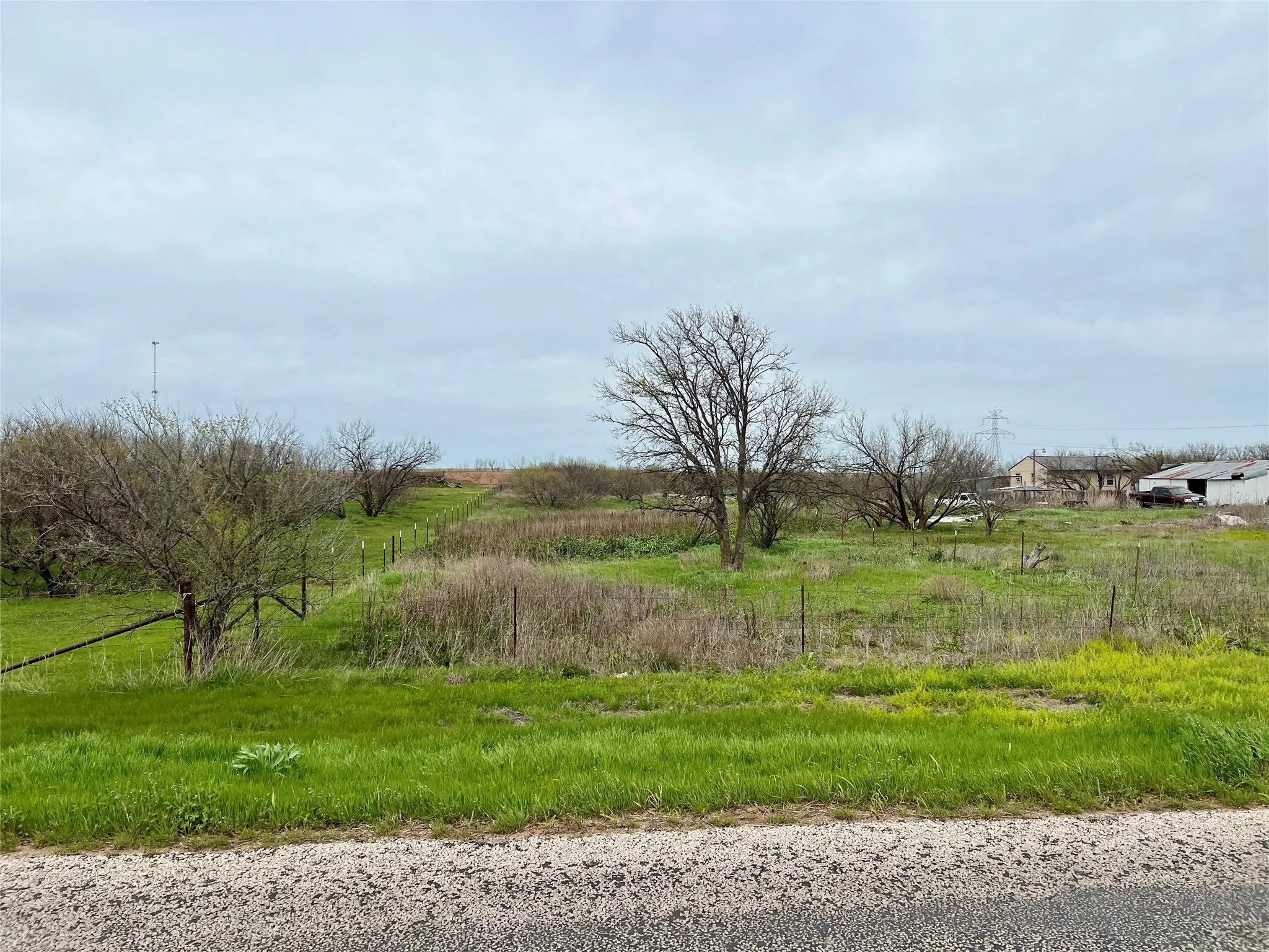 View of yard with a rural view