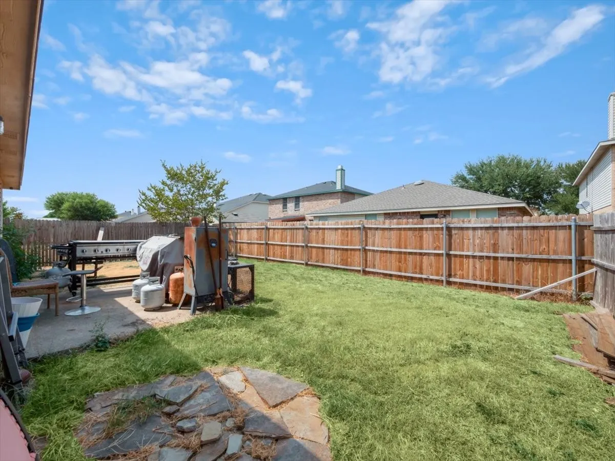 View of yard with a patio