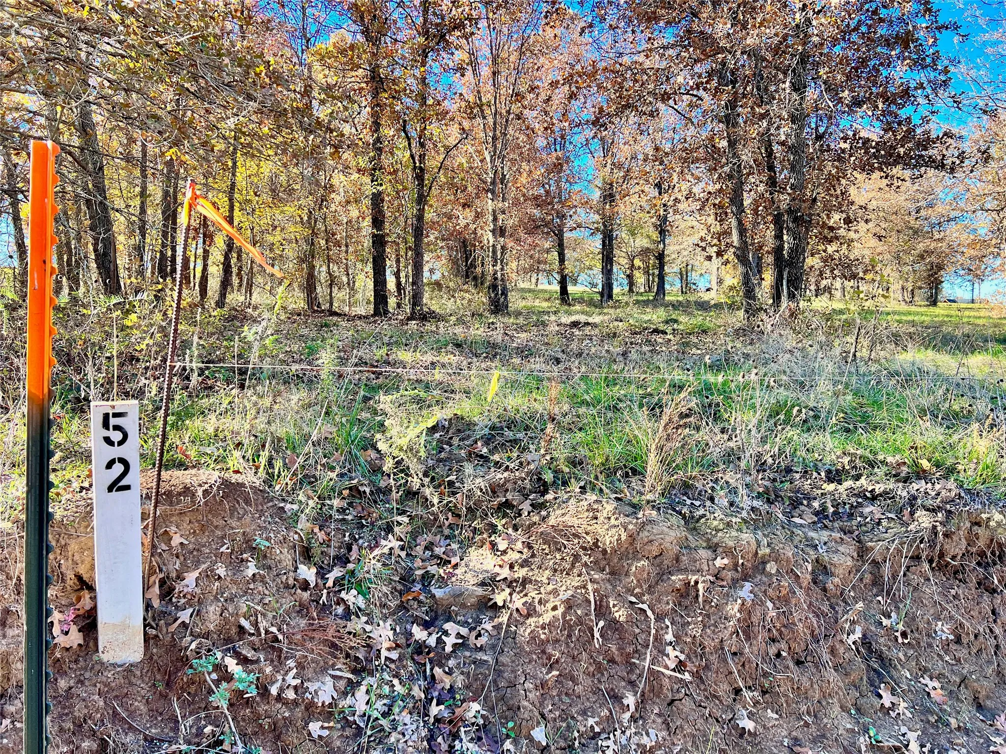 Property marker identifies Lot 52 within Admiral Shores.