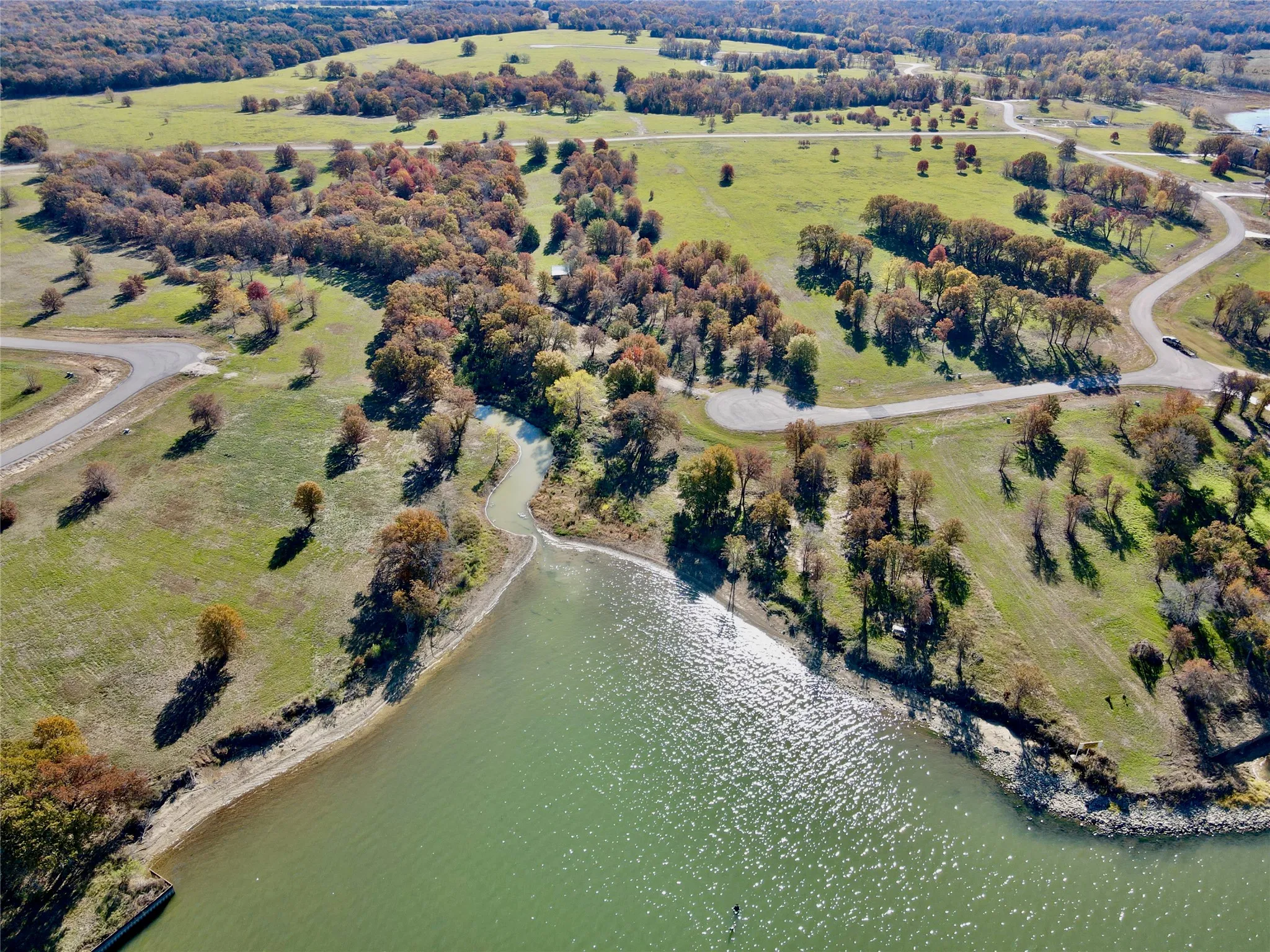 Aerial perspective of the protected cove and neighborhood.