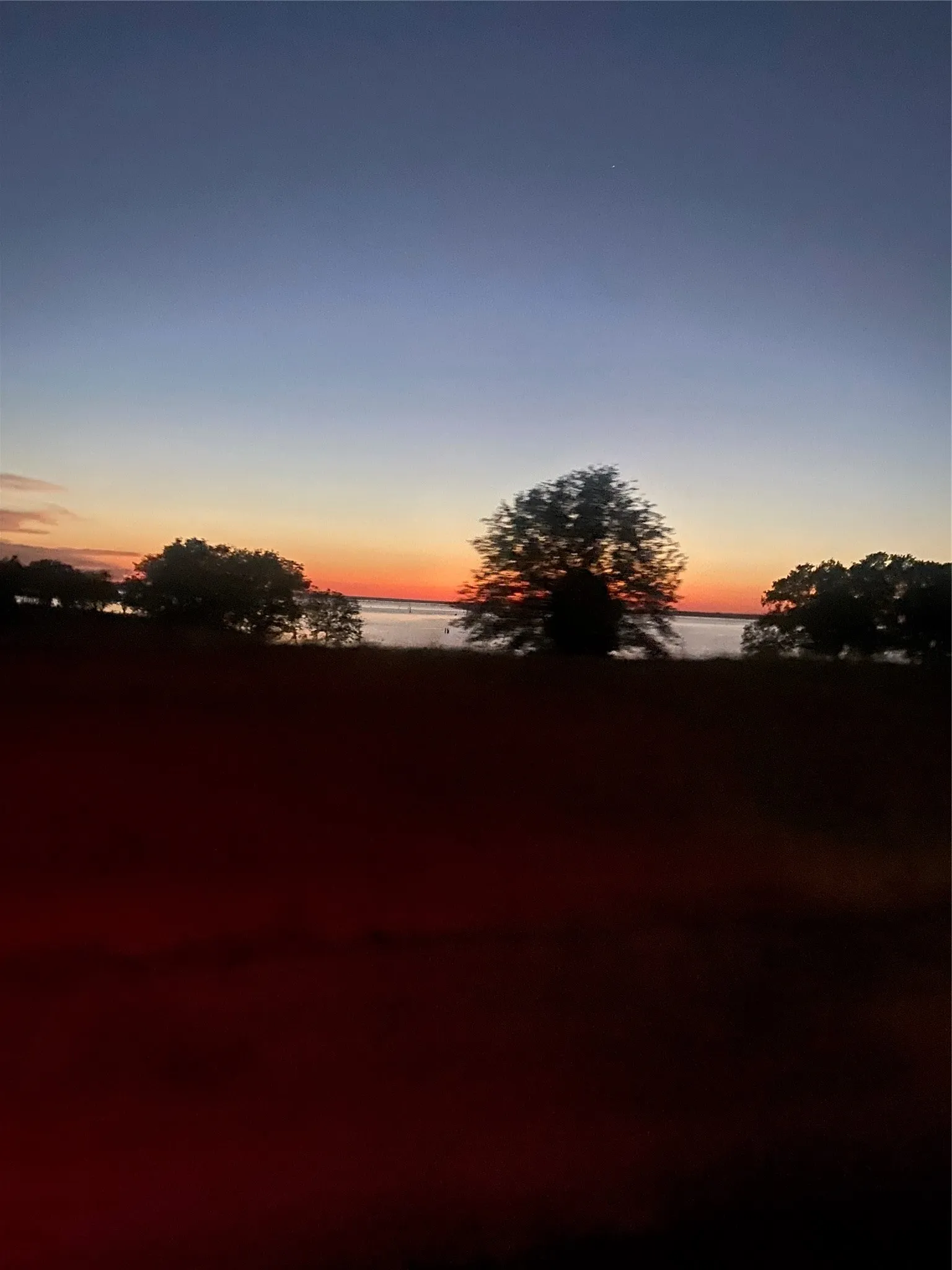 Sunset silhouettes create unforgettable lakeside evenings.