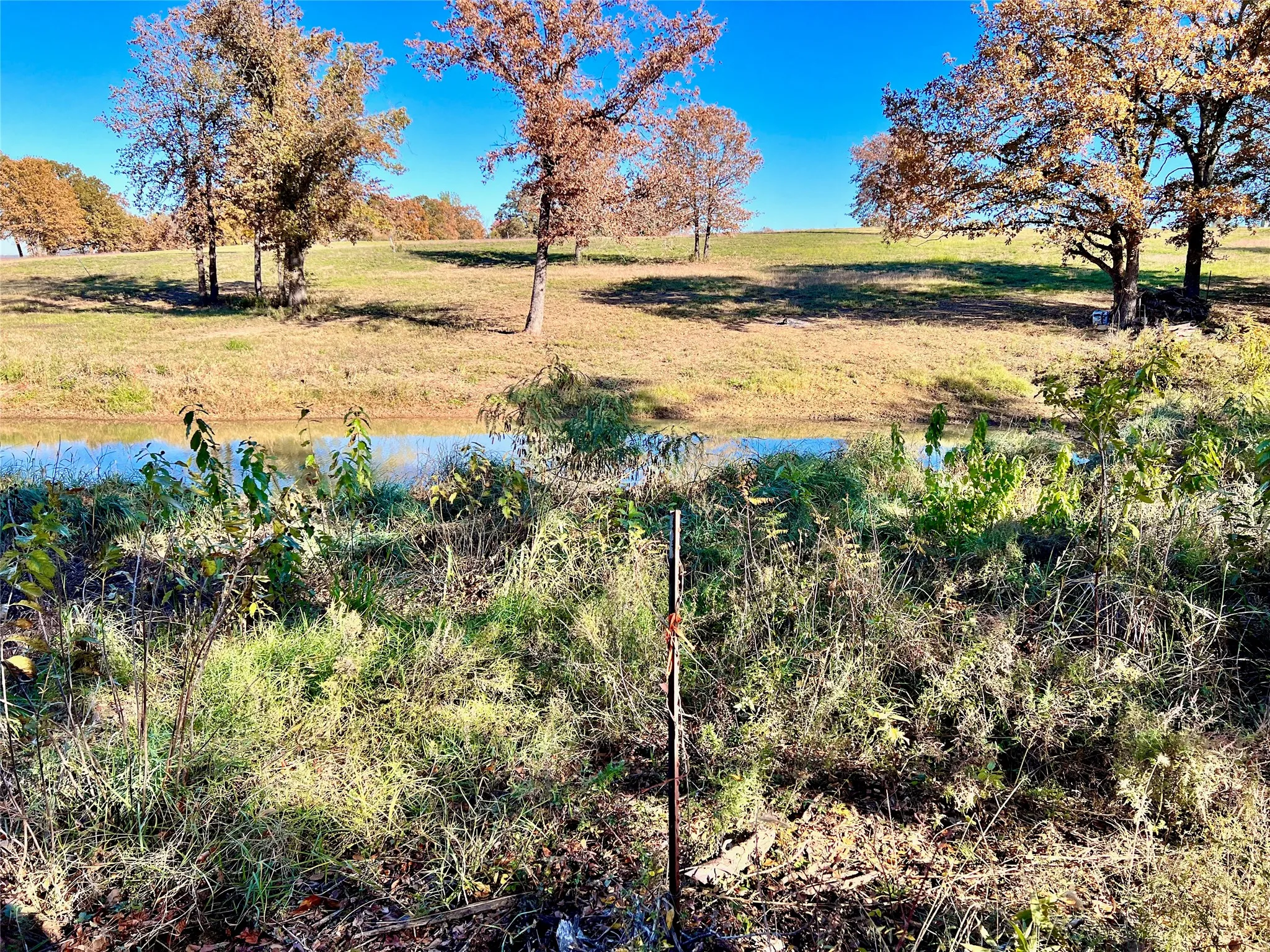 Natural drainage feature blends into the landscape.