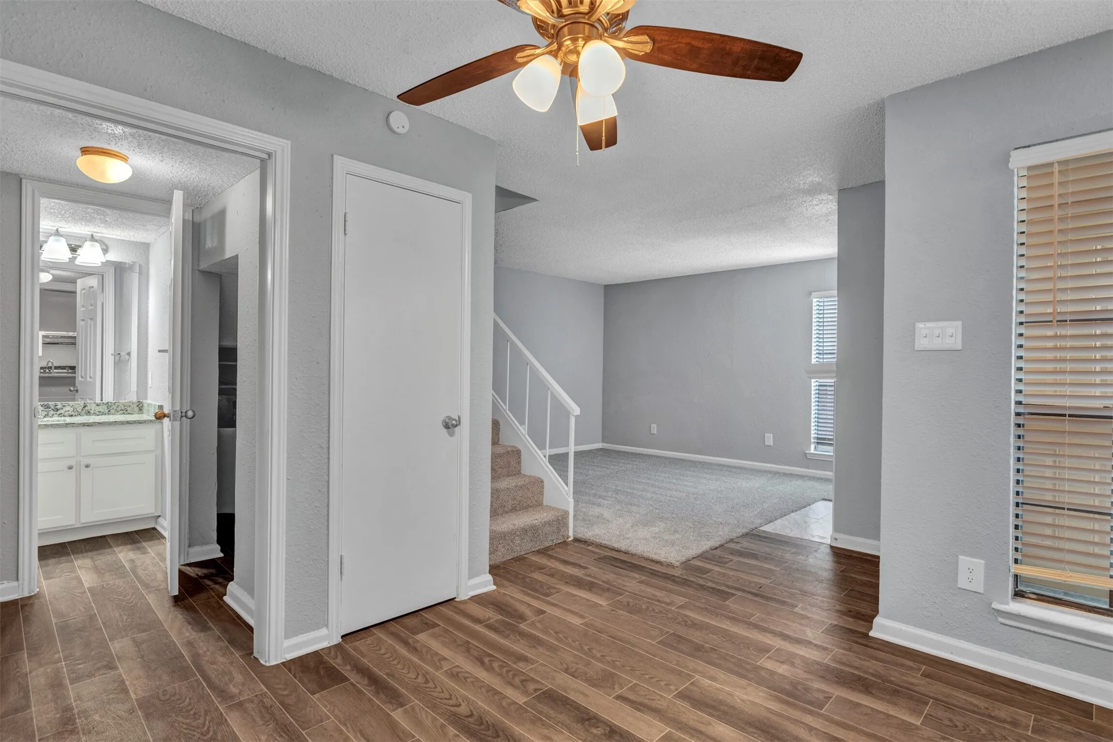 View into 1/2 bath w- laundry area before