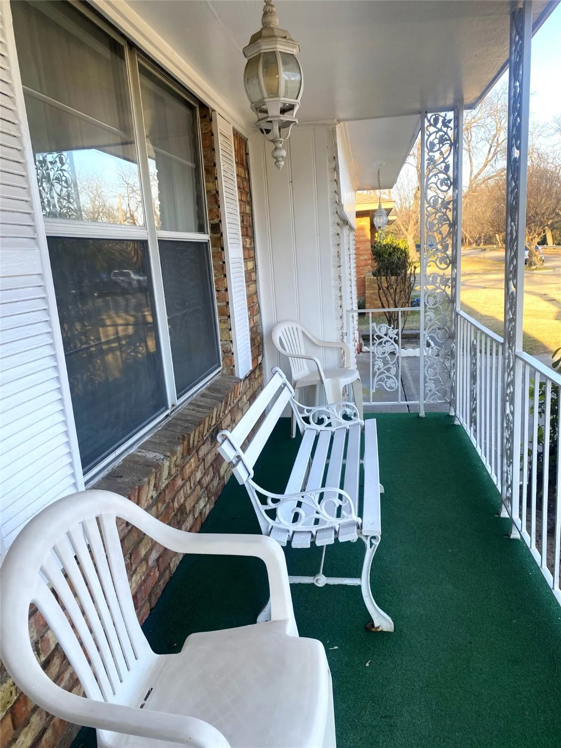 Balcony featuring covered porch