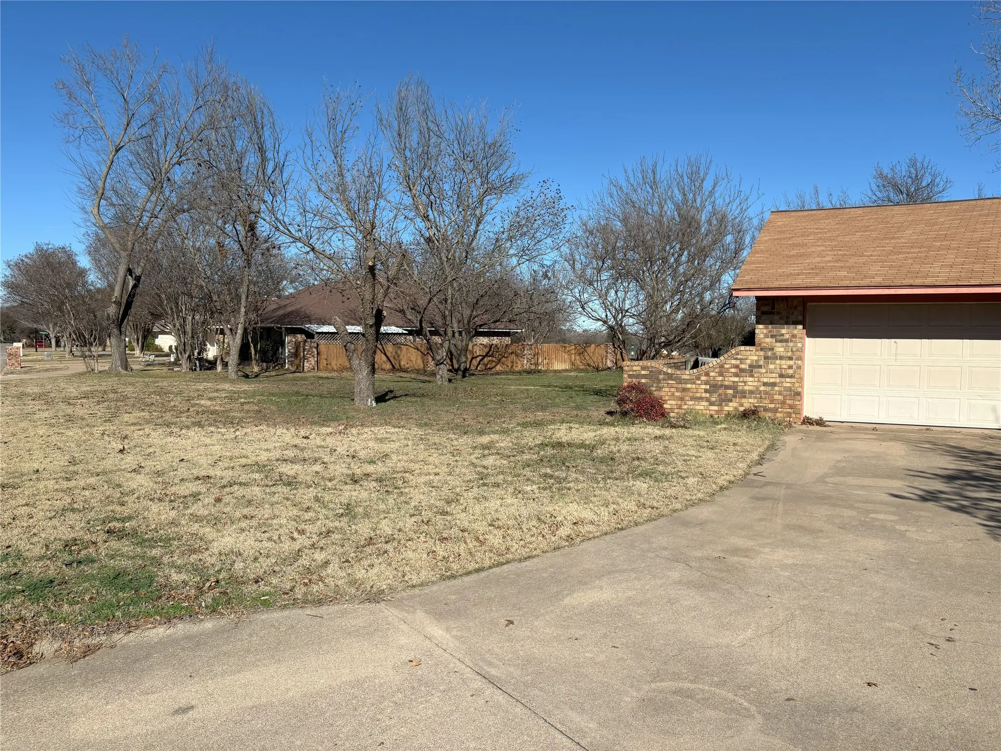 View of yard with a garage