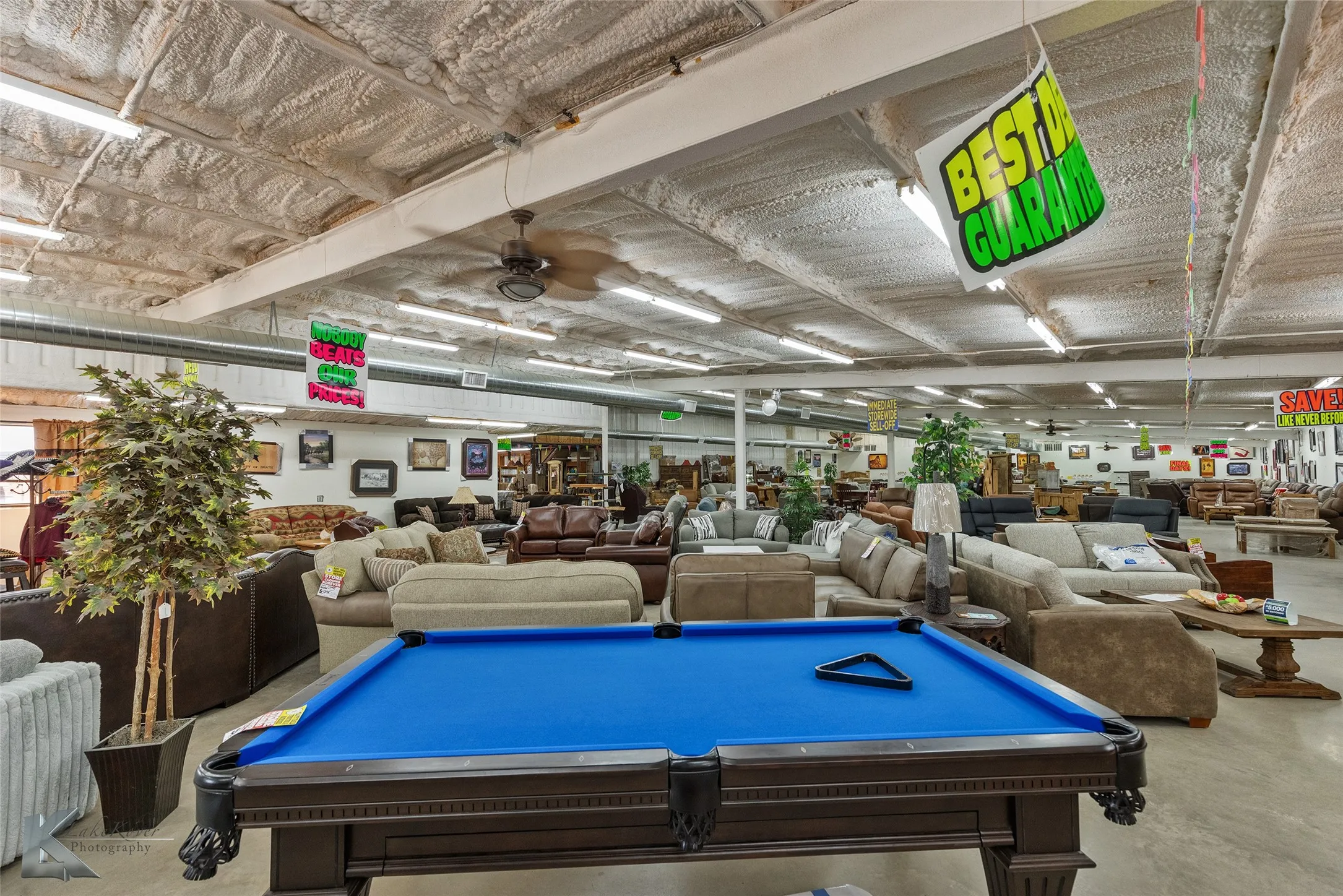 Game room with pool table, concrete floors, and ceiling fan